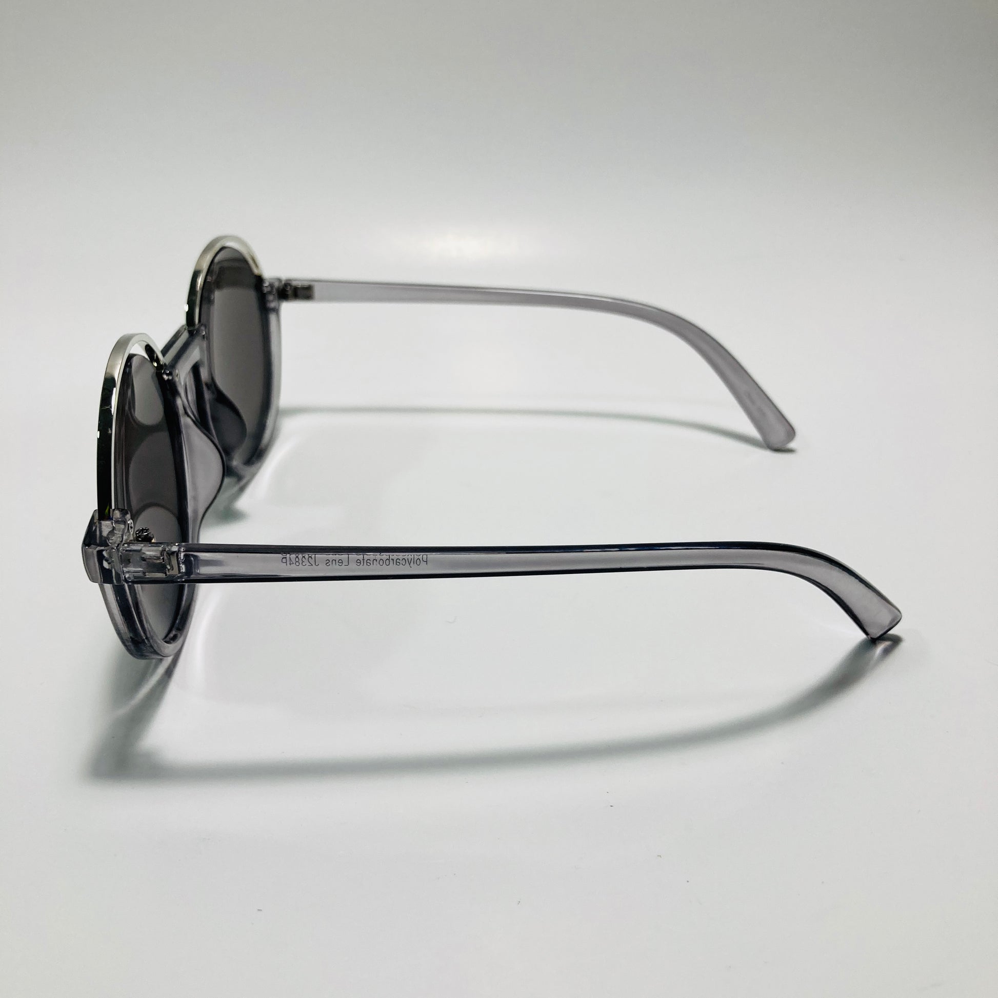 womens gray and silver round sunglasses