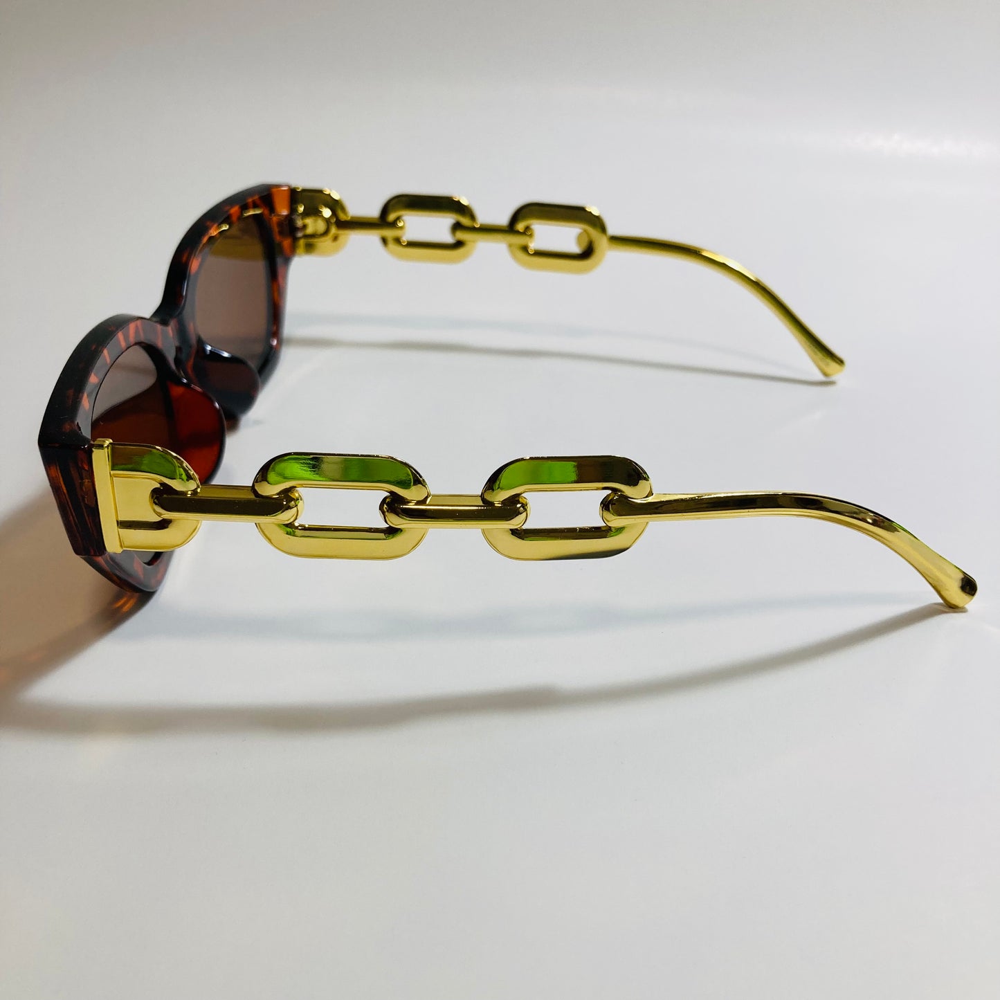 brown square womens sunglasses with gold arms