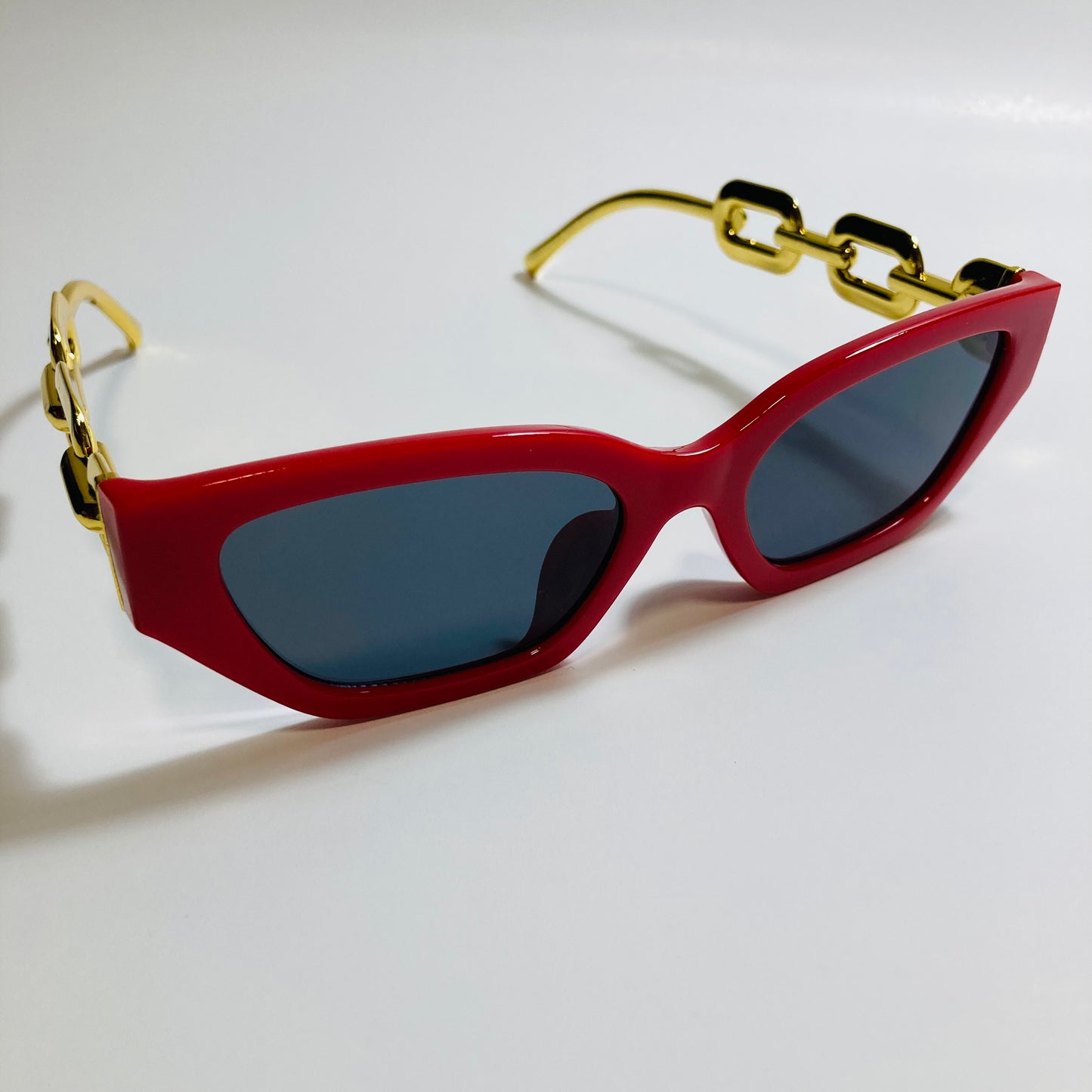 red and black square womens sunglasses with gold arms