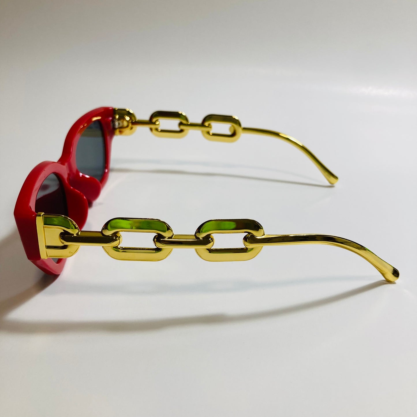 red and black square womens sunglasses with gold arms