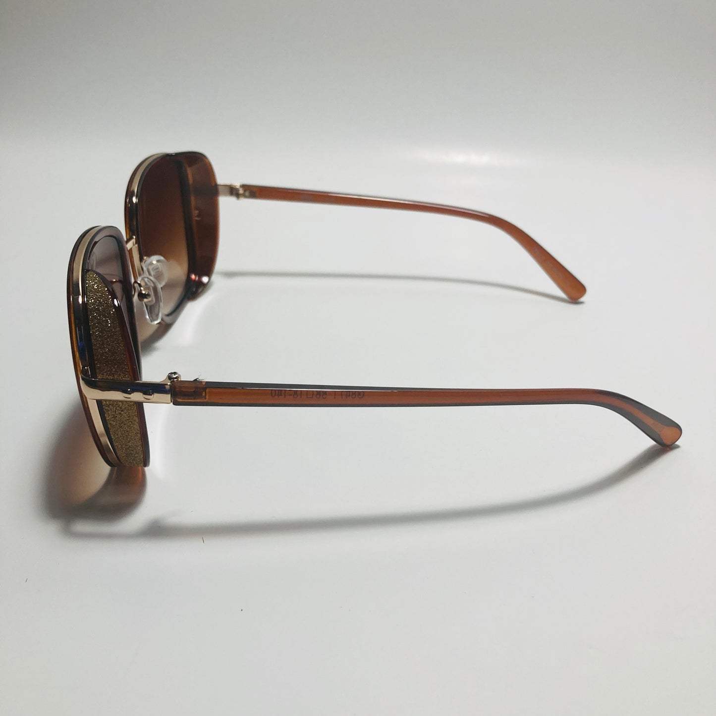 brown elton john sunglasses
