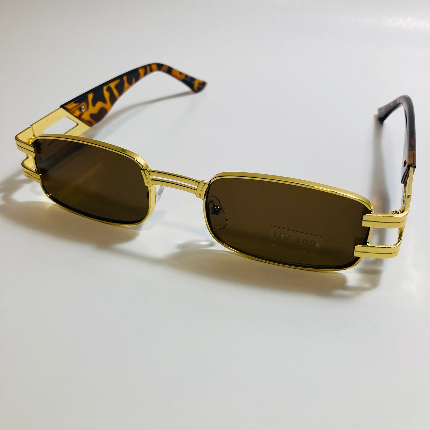 mens and womens gold square sunglasses with brown lenses