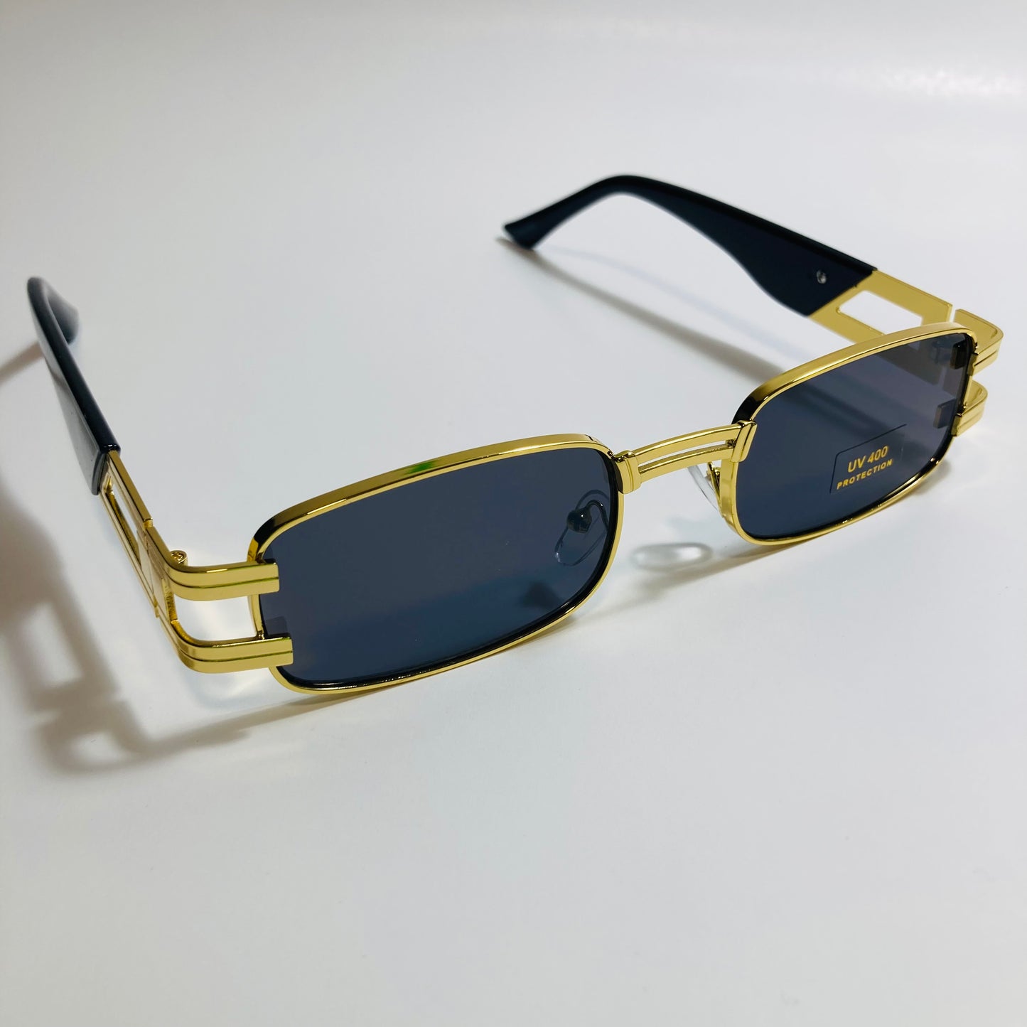 mens and womens gold square sunglasses with black lenses