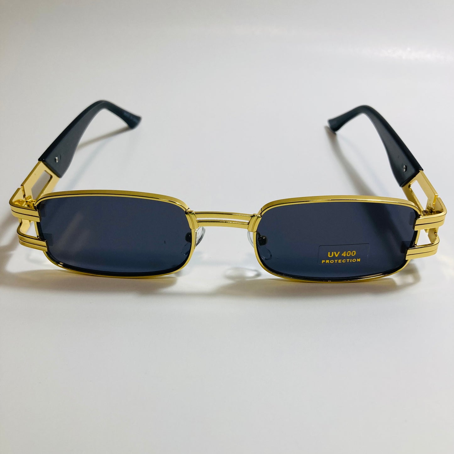 mens and womens gold square sunglasses with black lenses