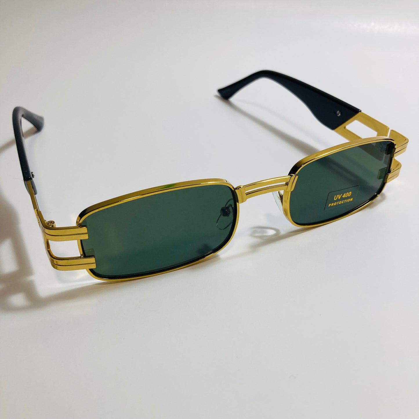 mens and womens gold square sunglasses with green lenses
