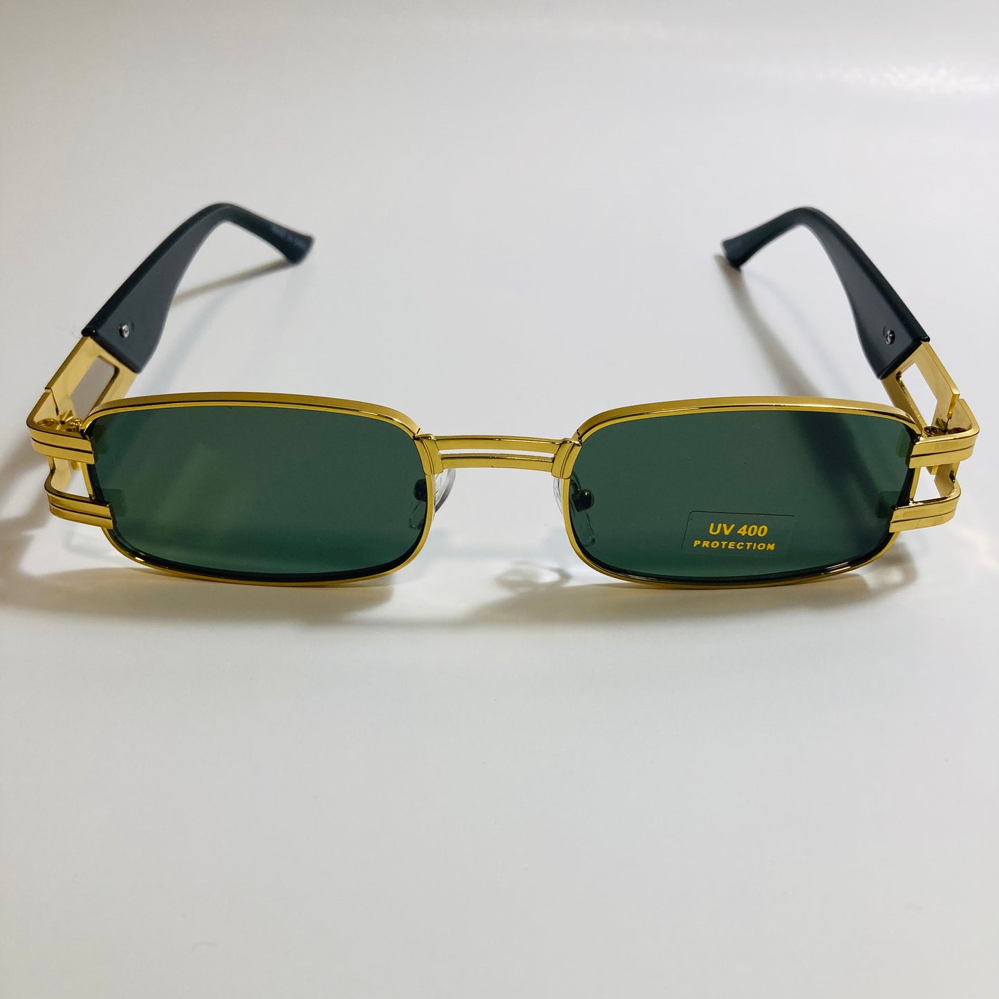 mens and womens gold square sunglasses with green lenses