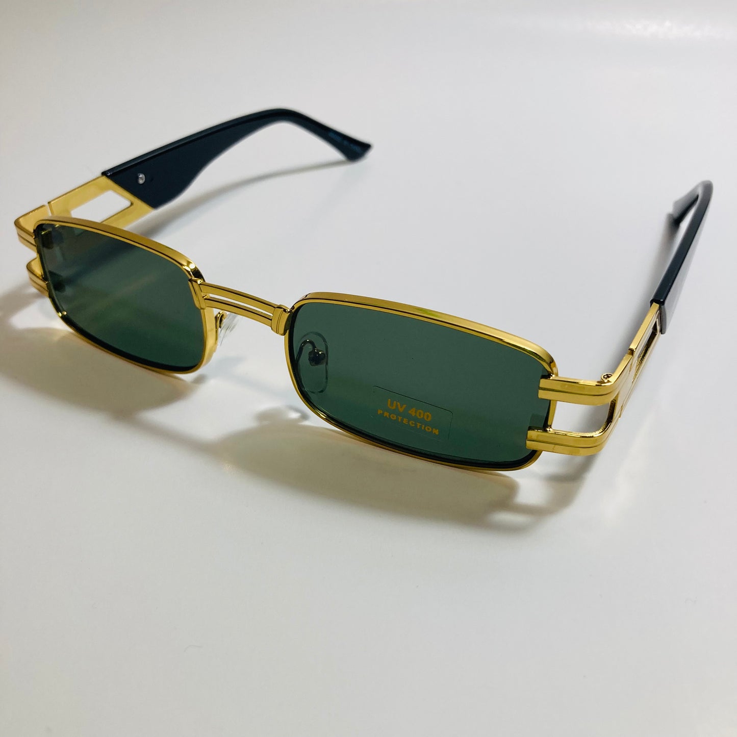 mens and womens gold square sunglasses with green lenses