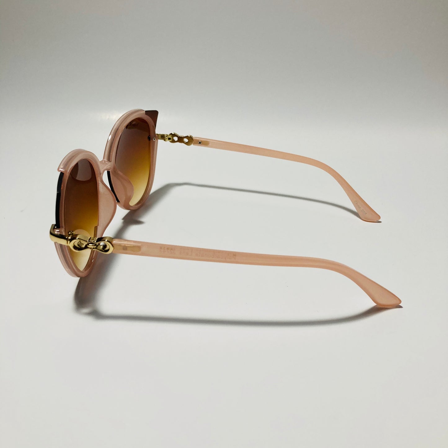 Womens tan and brown cat eye sunglasses
