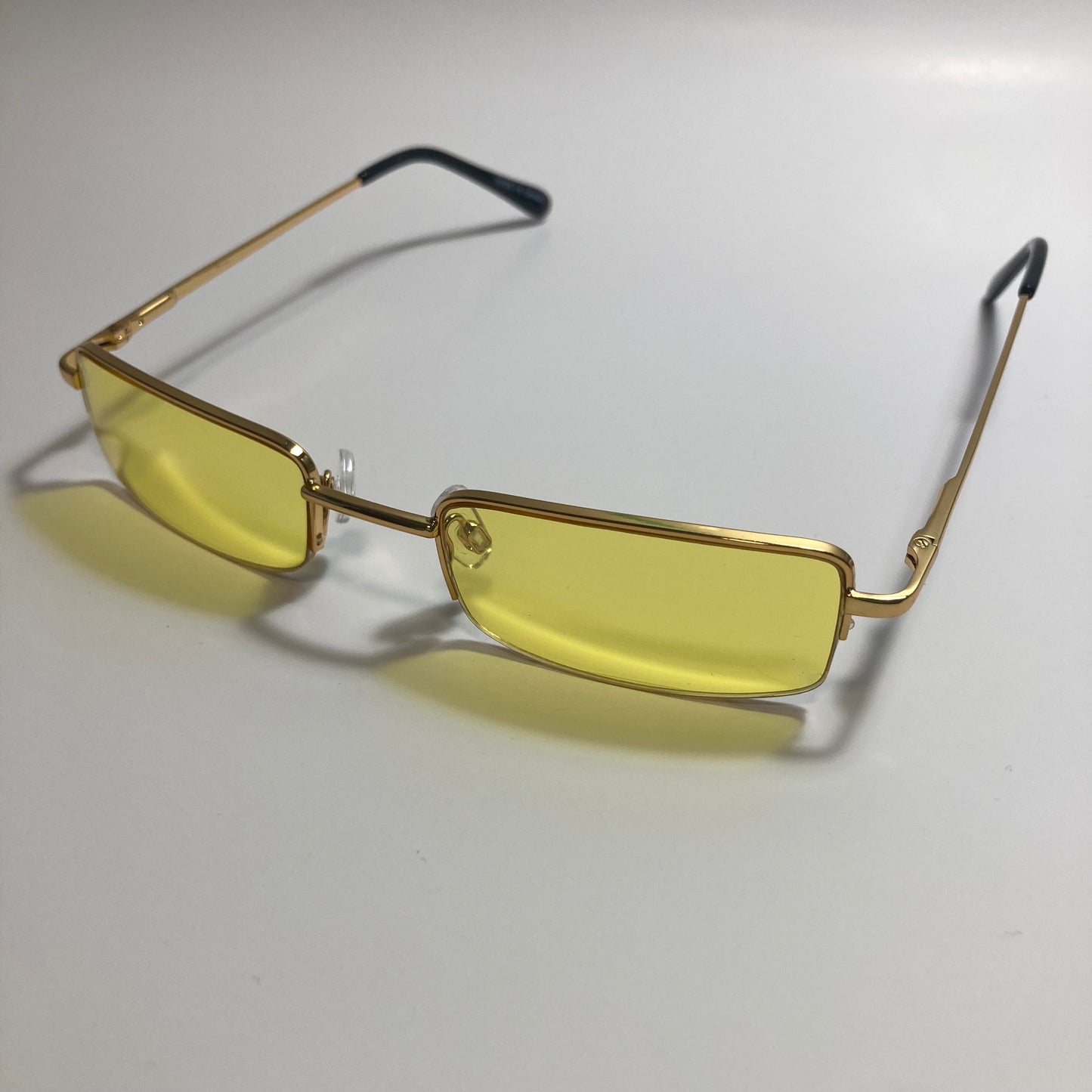 womens and mens yellow and gold metal square sunglasses