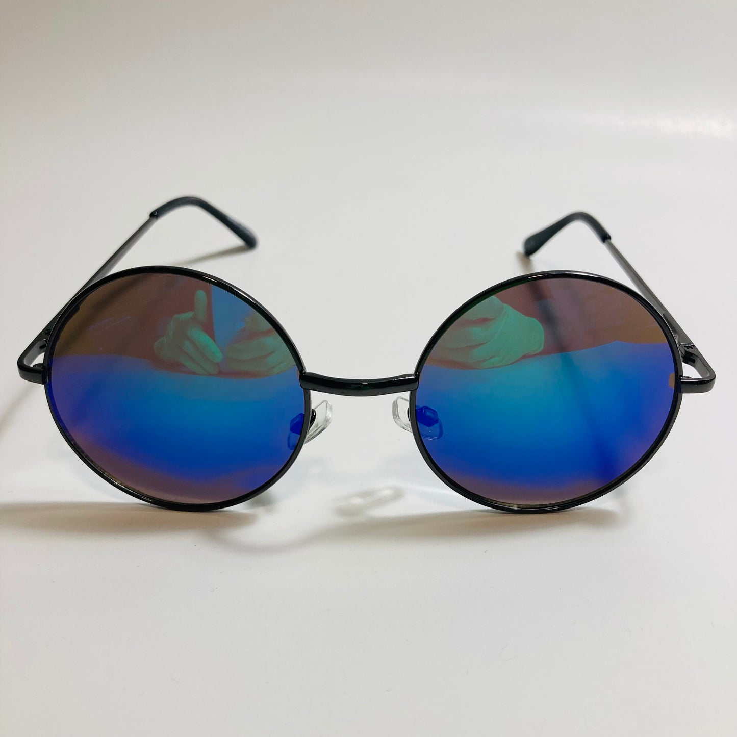 mens and womens black and blue mirrored round sunglasses