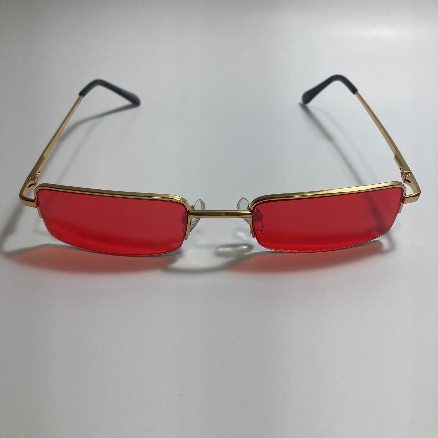 womens and mens red and gold metal square sunglasses