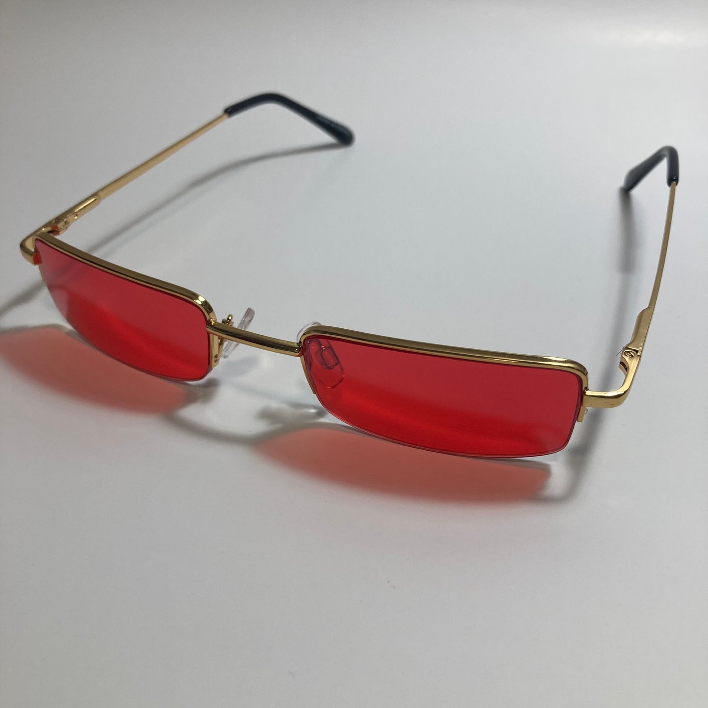 womens and mens red and gold metal square sunglasses