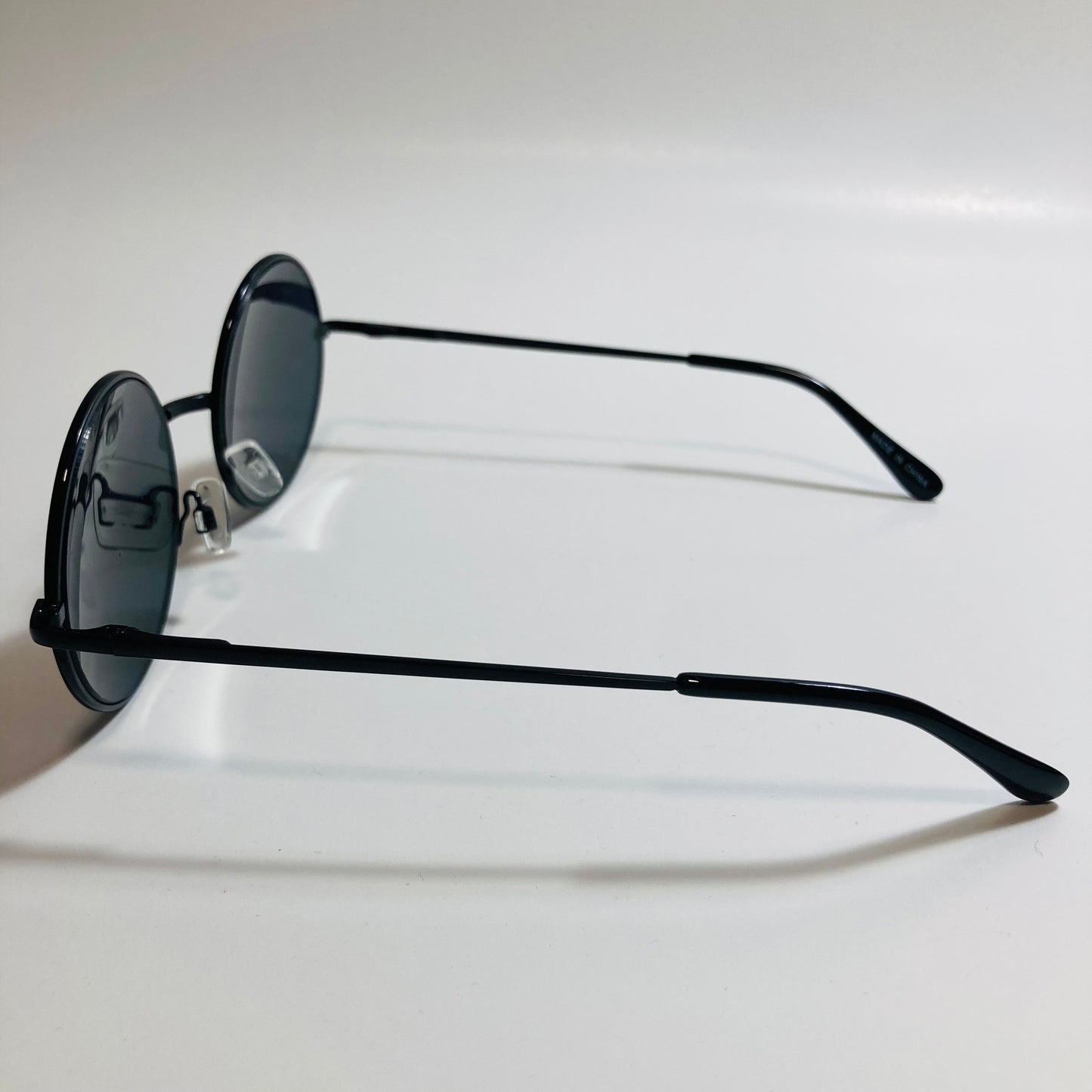 mens and womens yellow and black mirrored round sunglasses