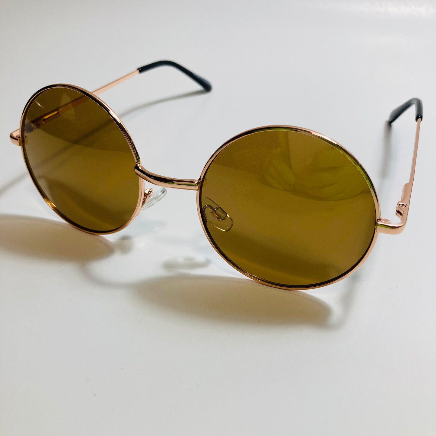 mens and womens gold and brown round sunglasses