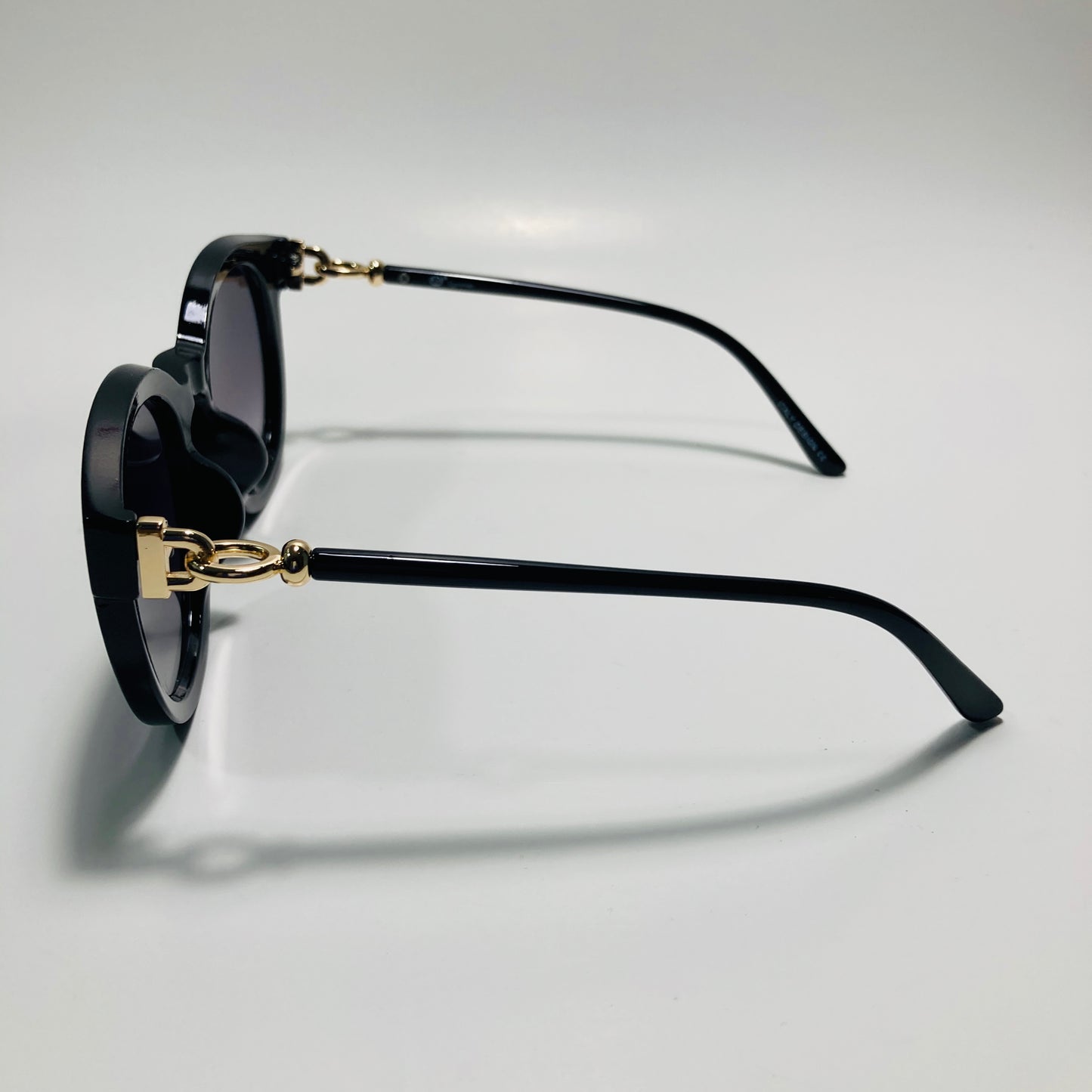 womens black round sunglasses with black lenses