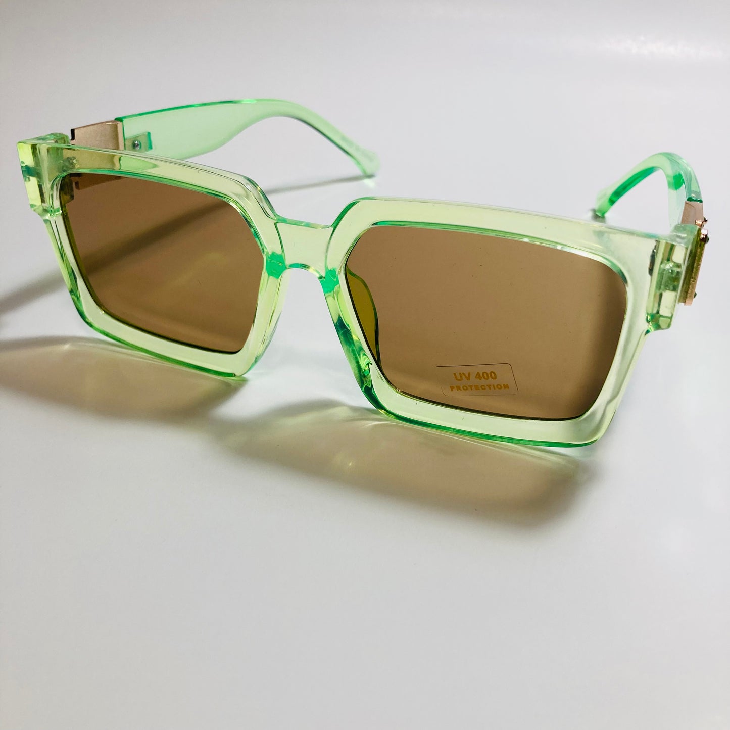 mens and womens green brown and gold square sunglasses