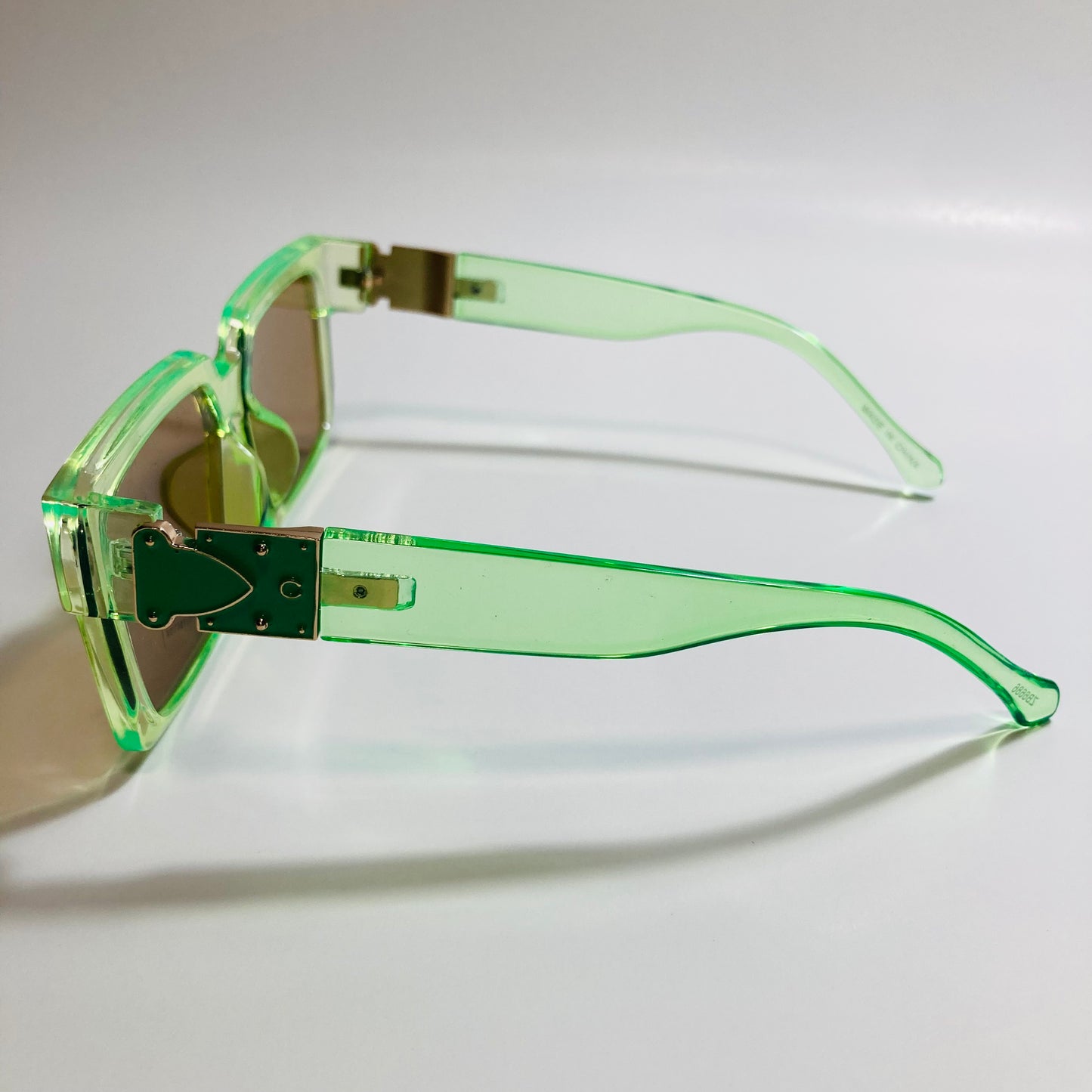 mens and womens green brown and gold square sunglasses