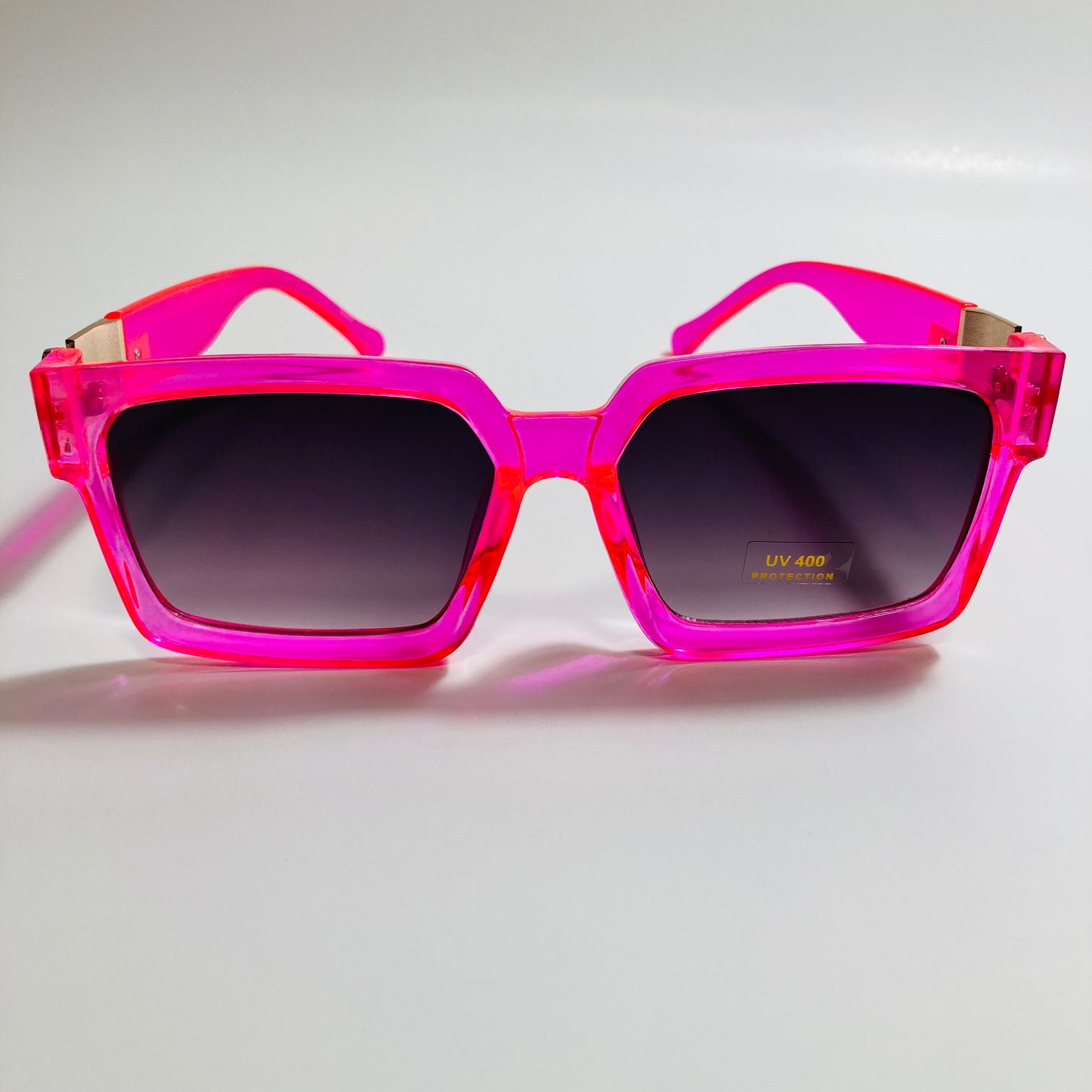 mens and womens pink black and gold square sunglasses