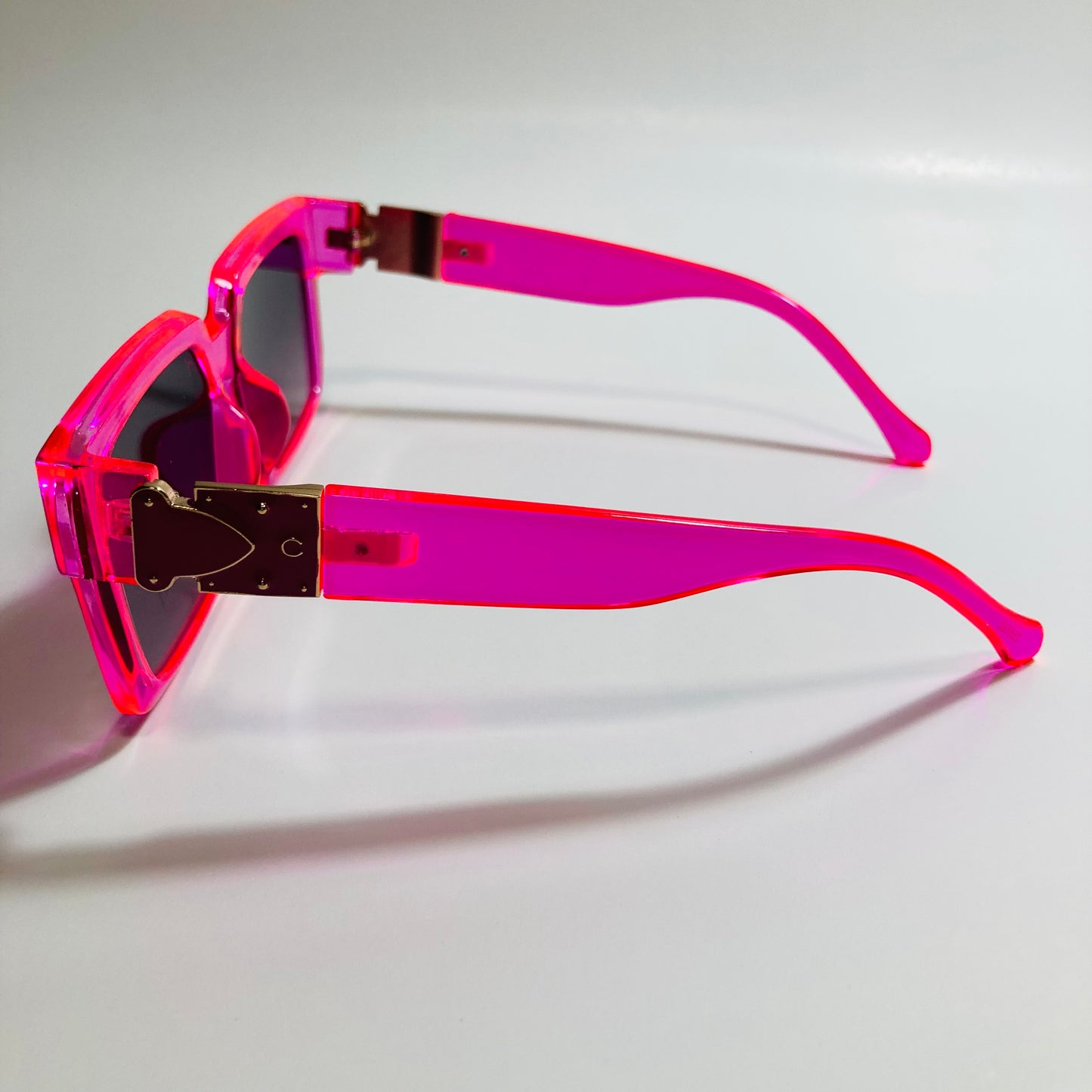 mens and womens pink black and gold square sunglasses