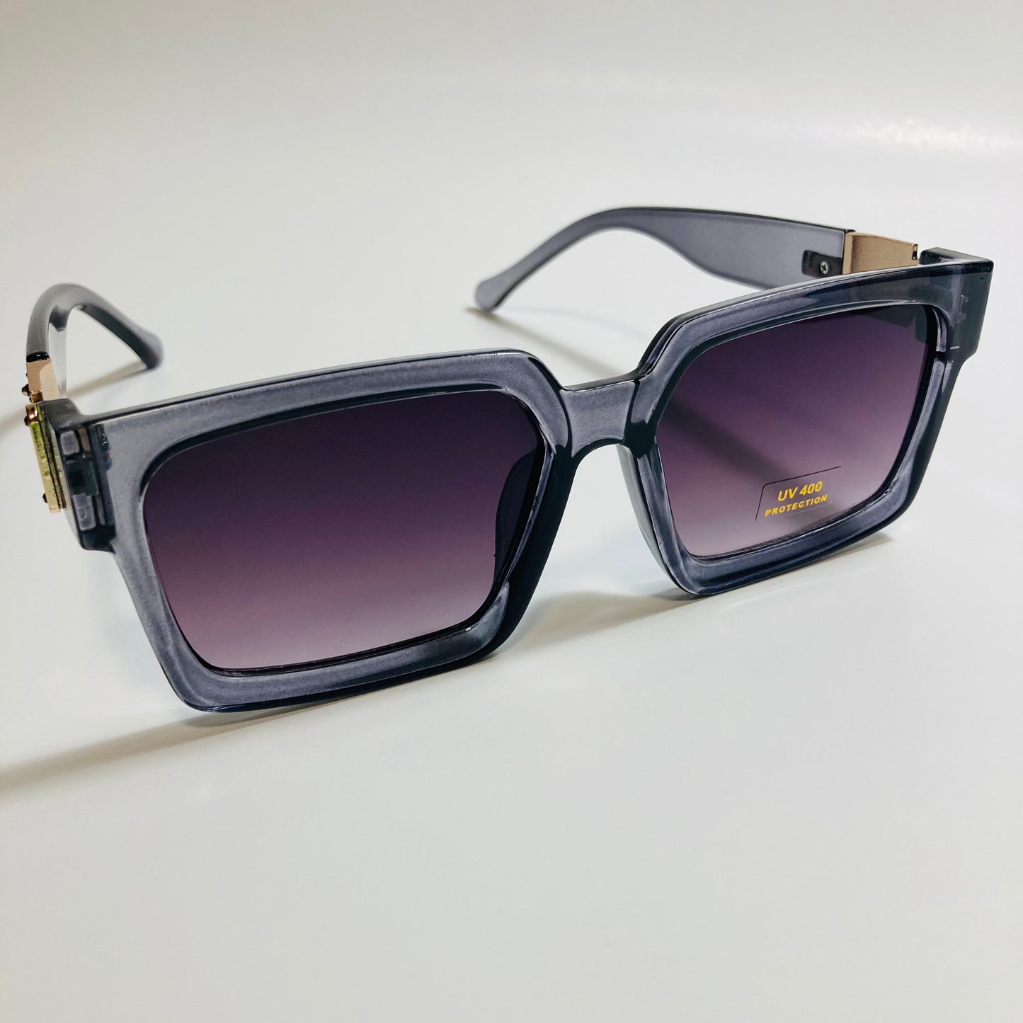 mens and womens gray black and gold square sunglasses