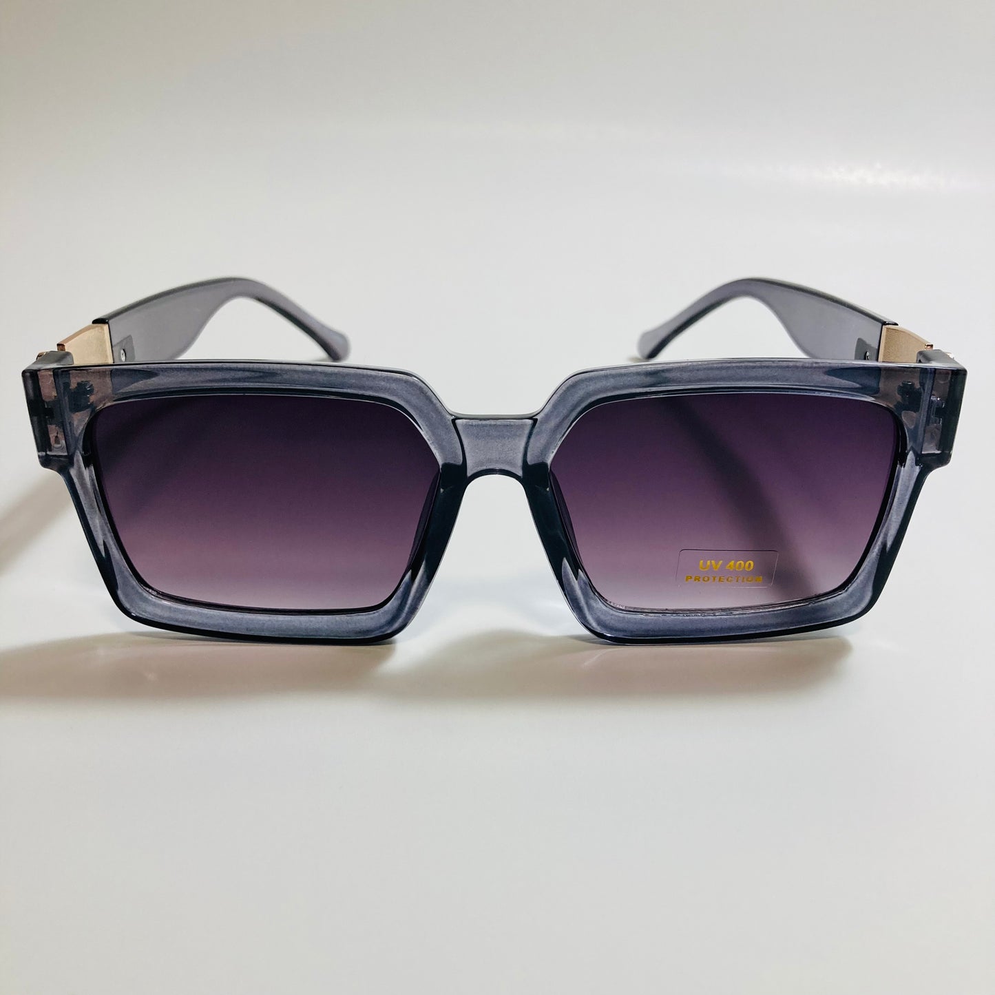 mens and womens gray black and gold square sunglasses