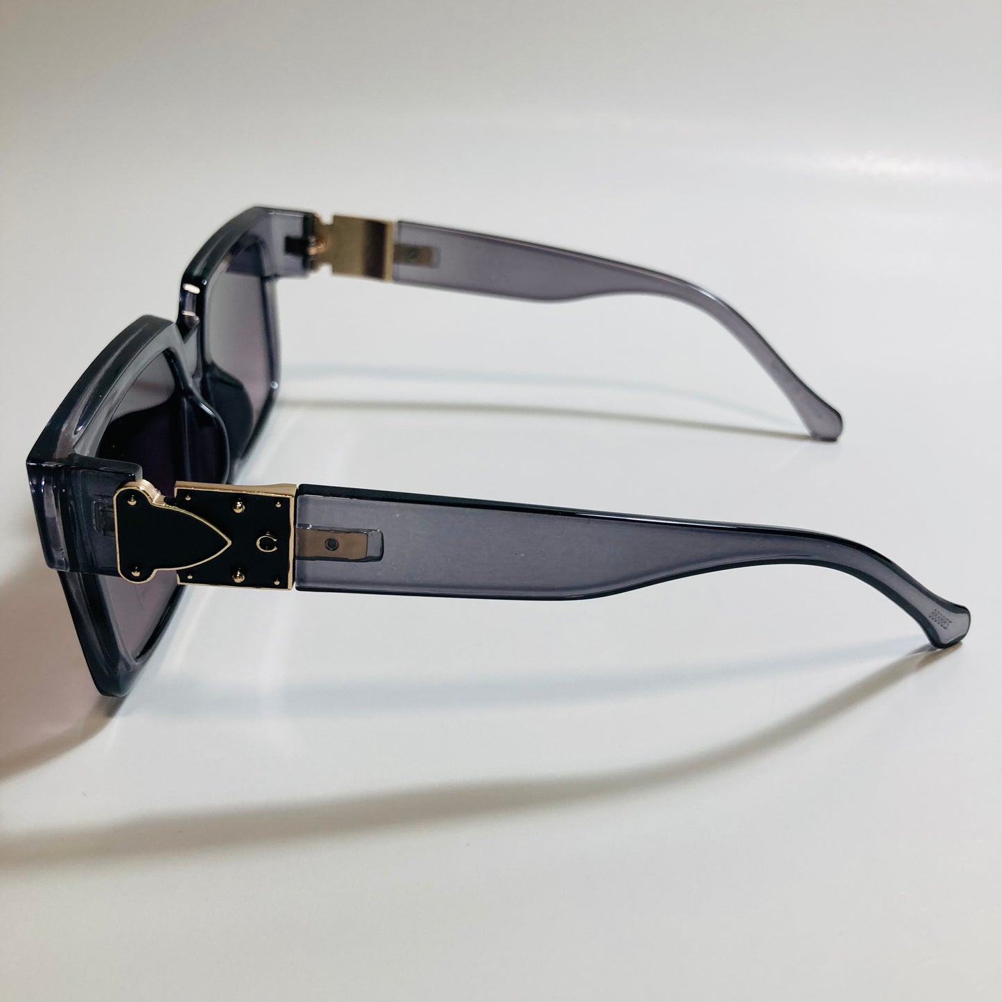mens and womens gray black and gold square sunglasses