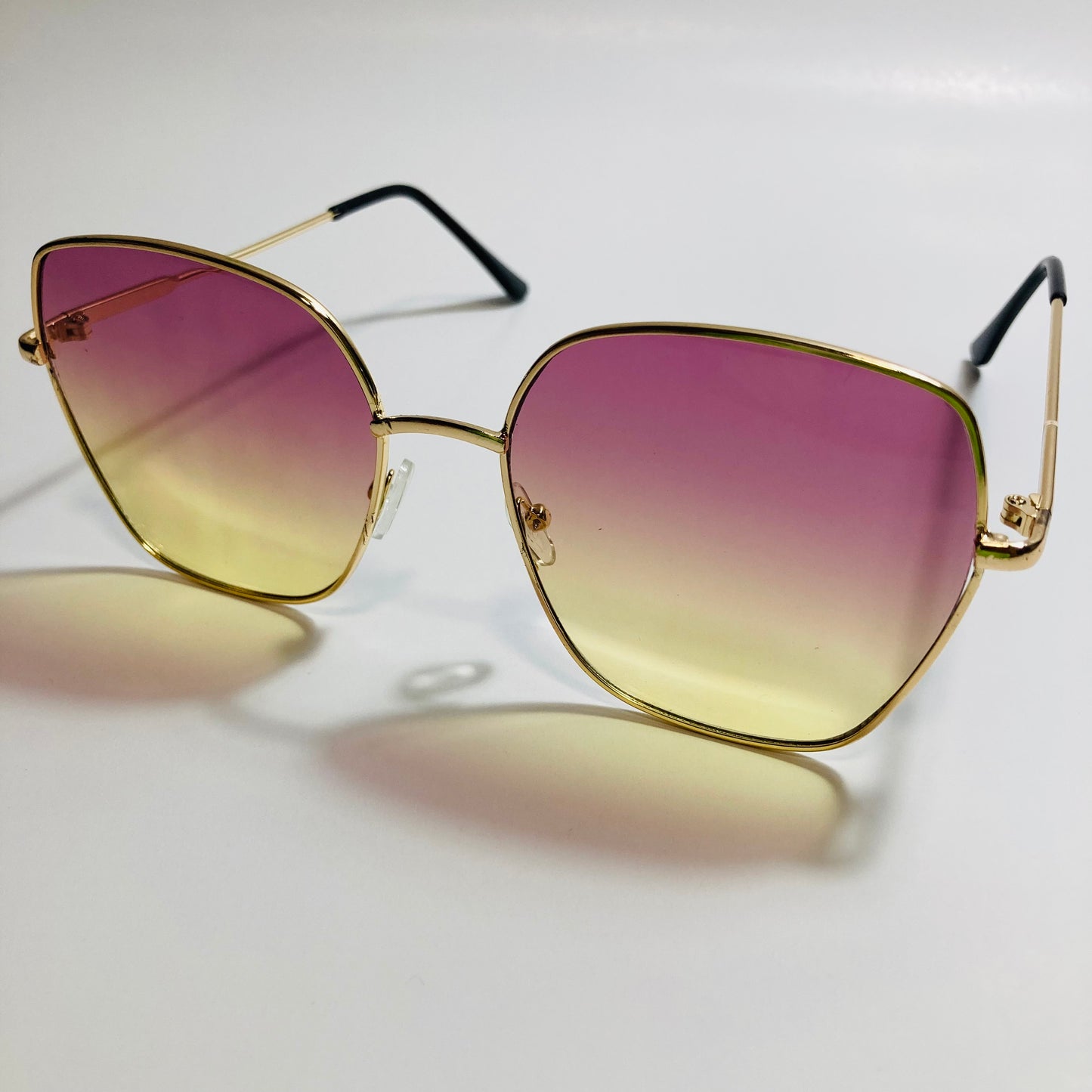 womens purple and yellow oversize sunglasses