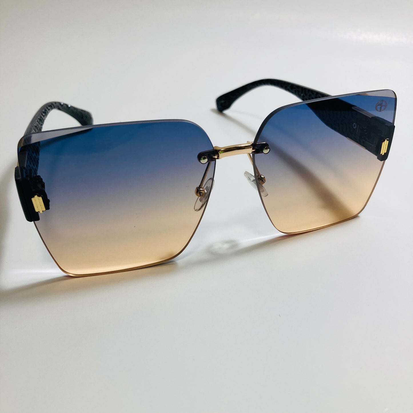 womens yellow and blue square rimless oversize sunglasses