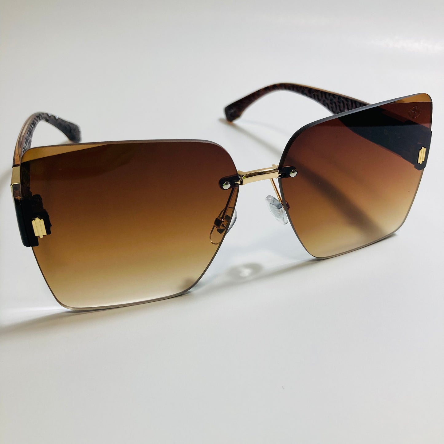 womens brown square rimless oversize sunglasses
