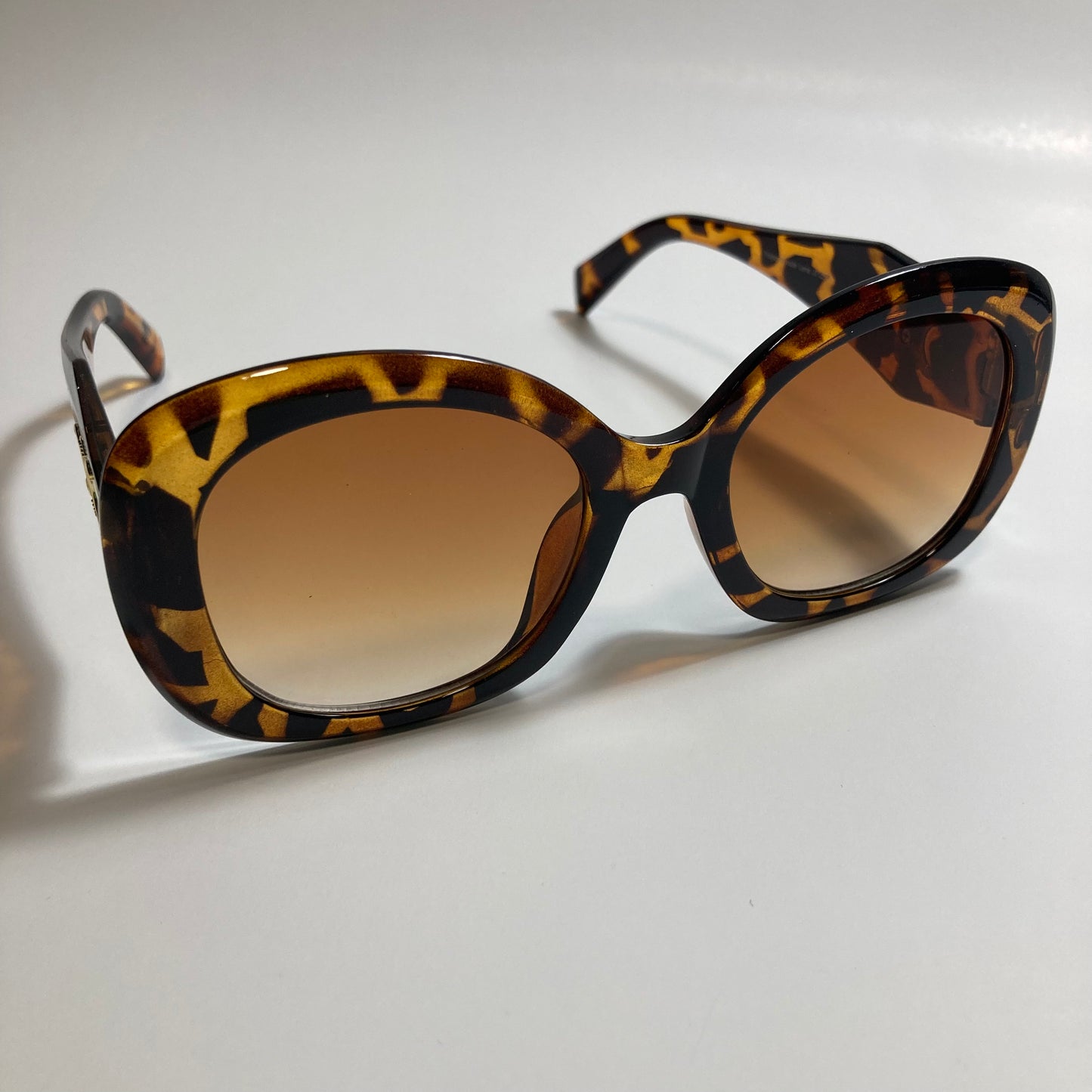 womens brown round sunglasses with brown lenses