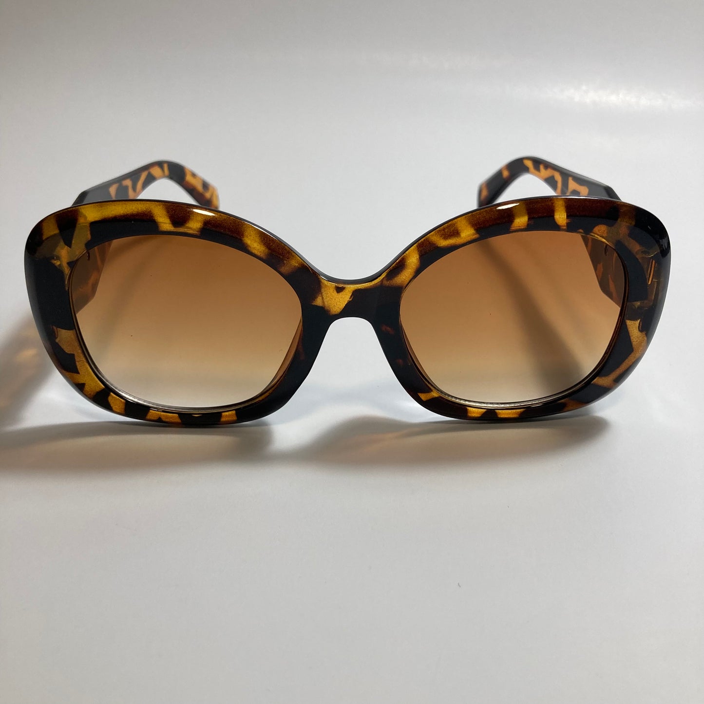 womens brown round sunglasses with brown lenses