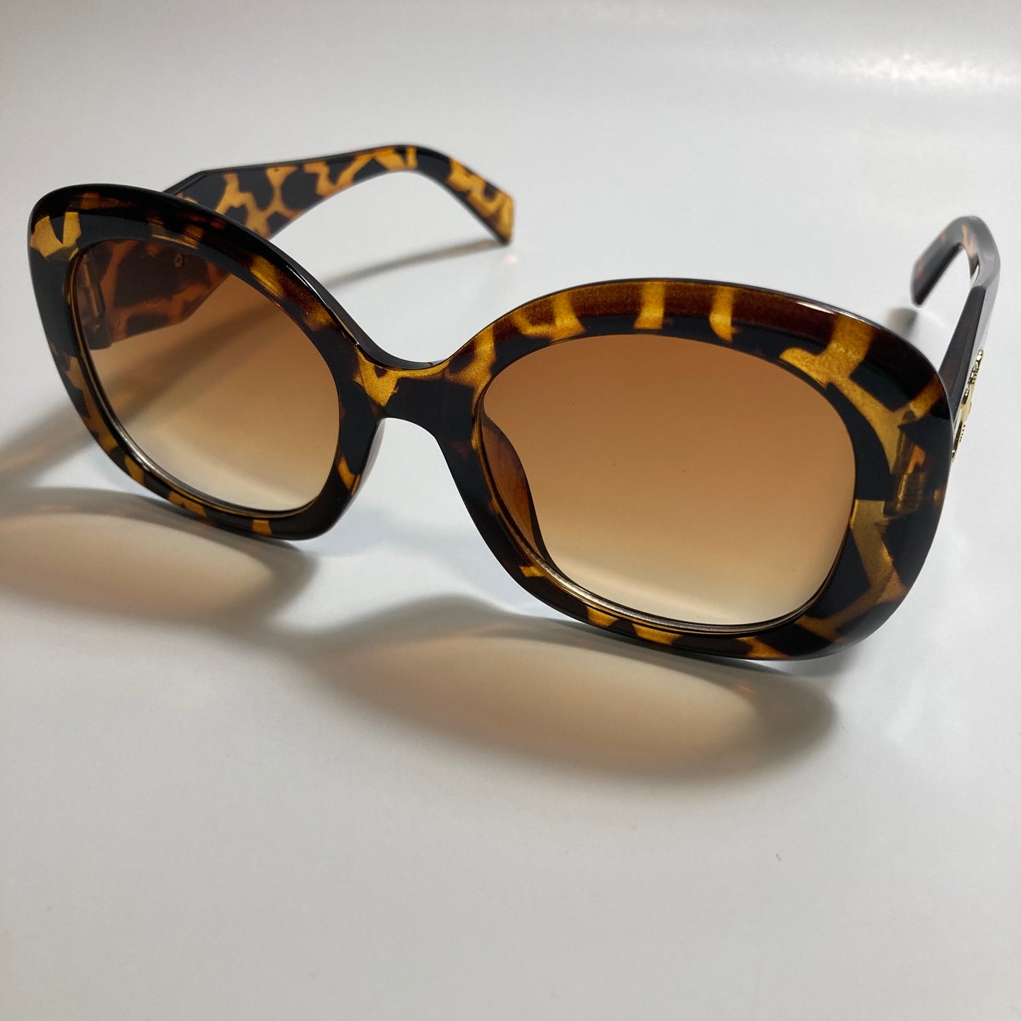 womens brown round sunglasses with brown lenses