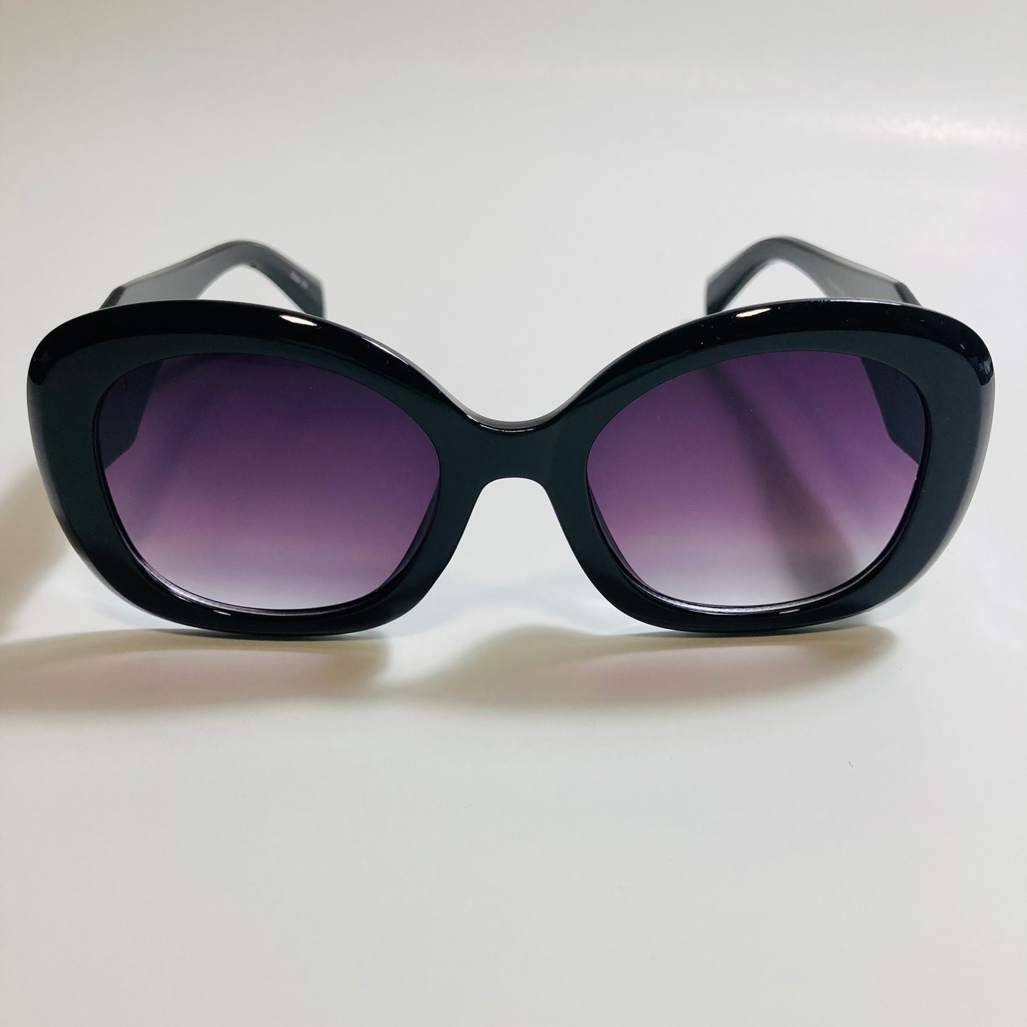 womens black round sunglasses with black lenses