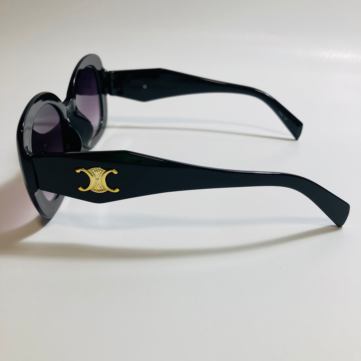womens black round sunglasses with black lenses