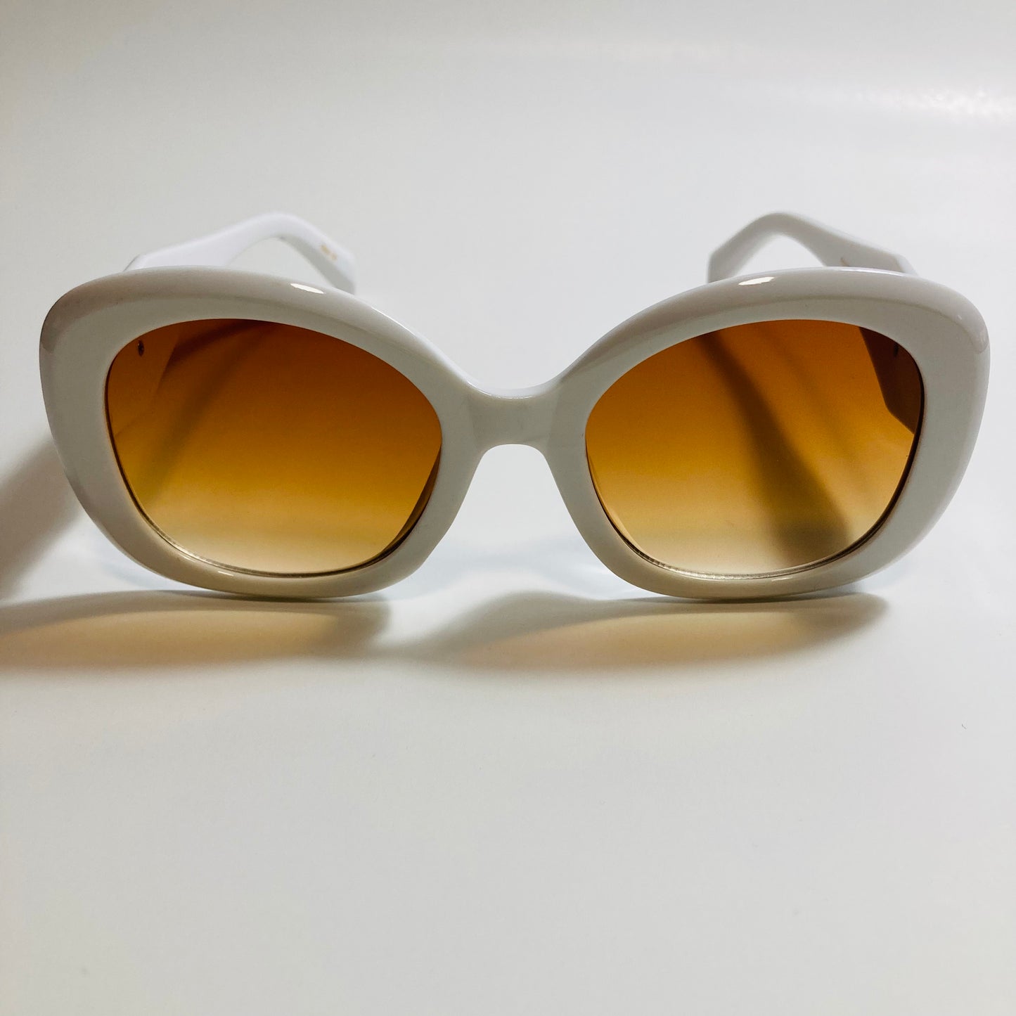 womens white round sunglasses with brown lenses