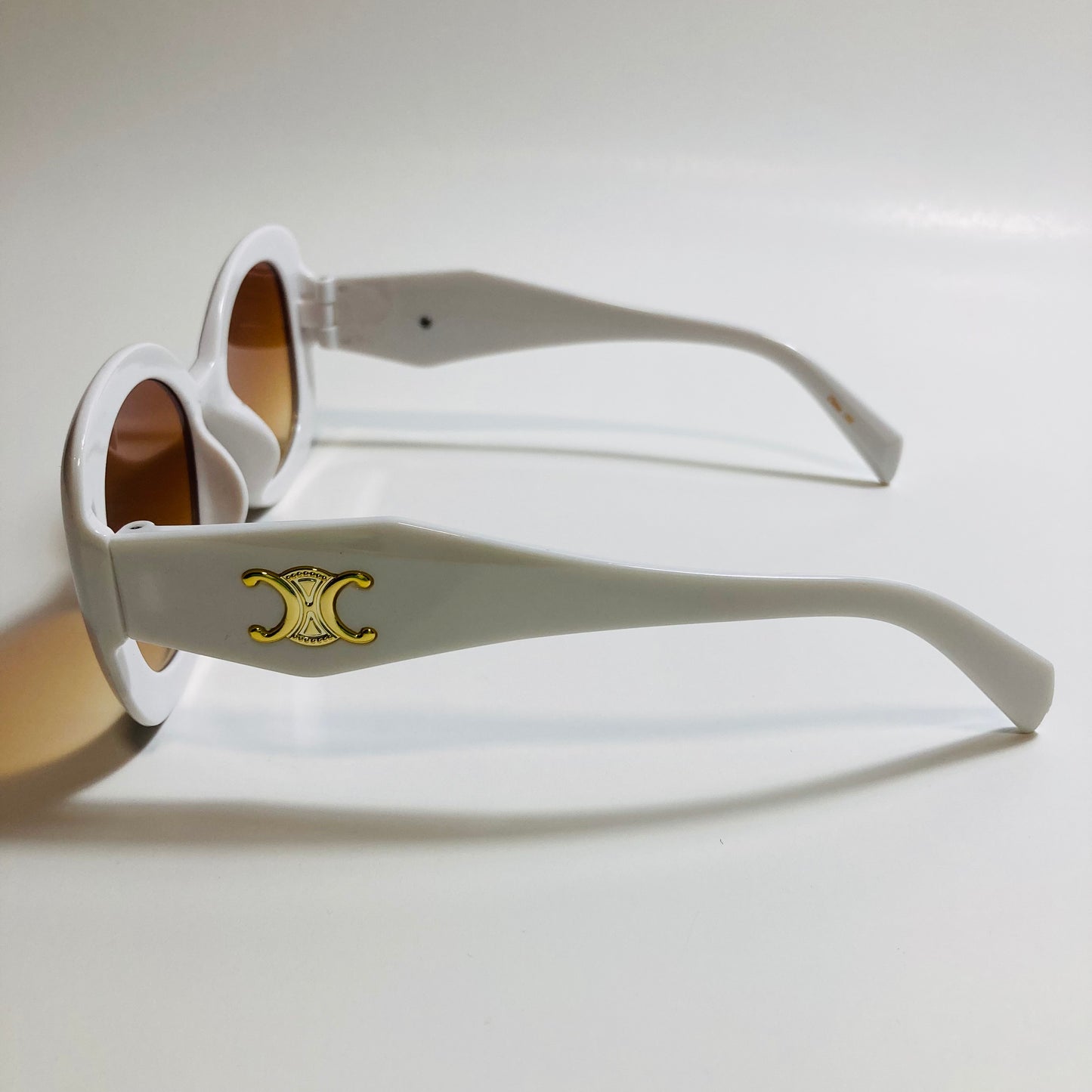 womens white round sunglasses with brown lenses