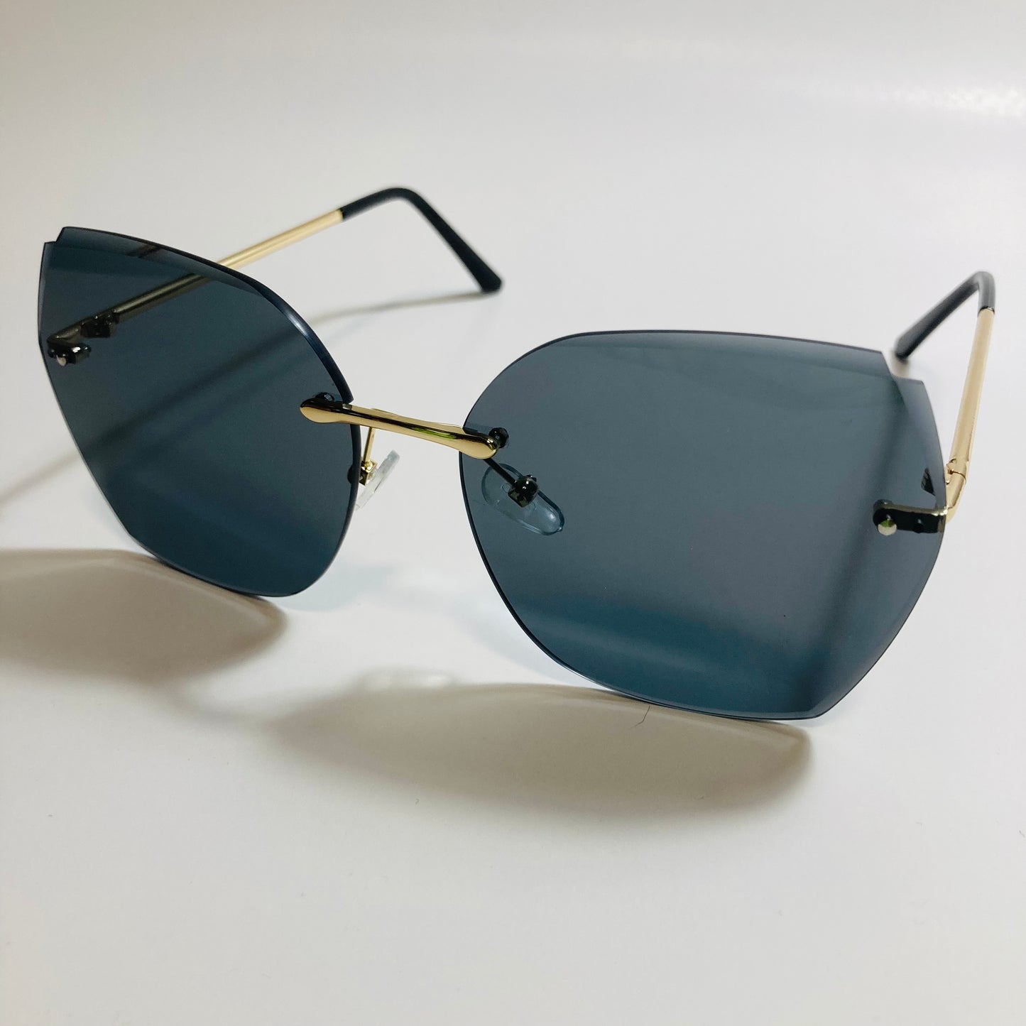 womens black oversize rimless sunglasses