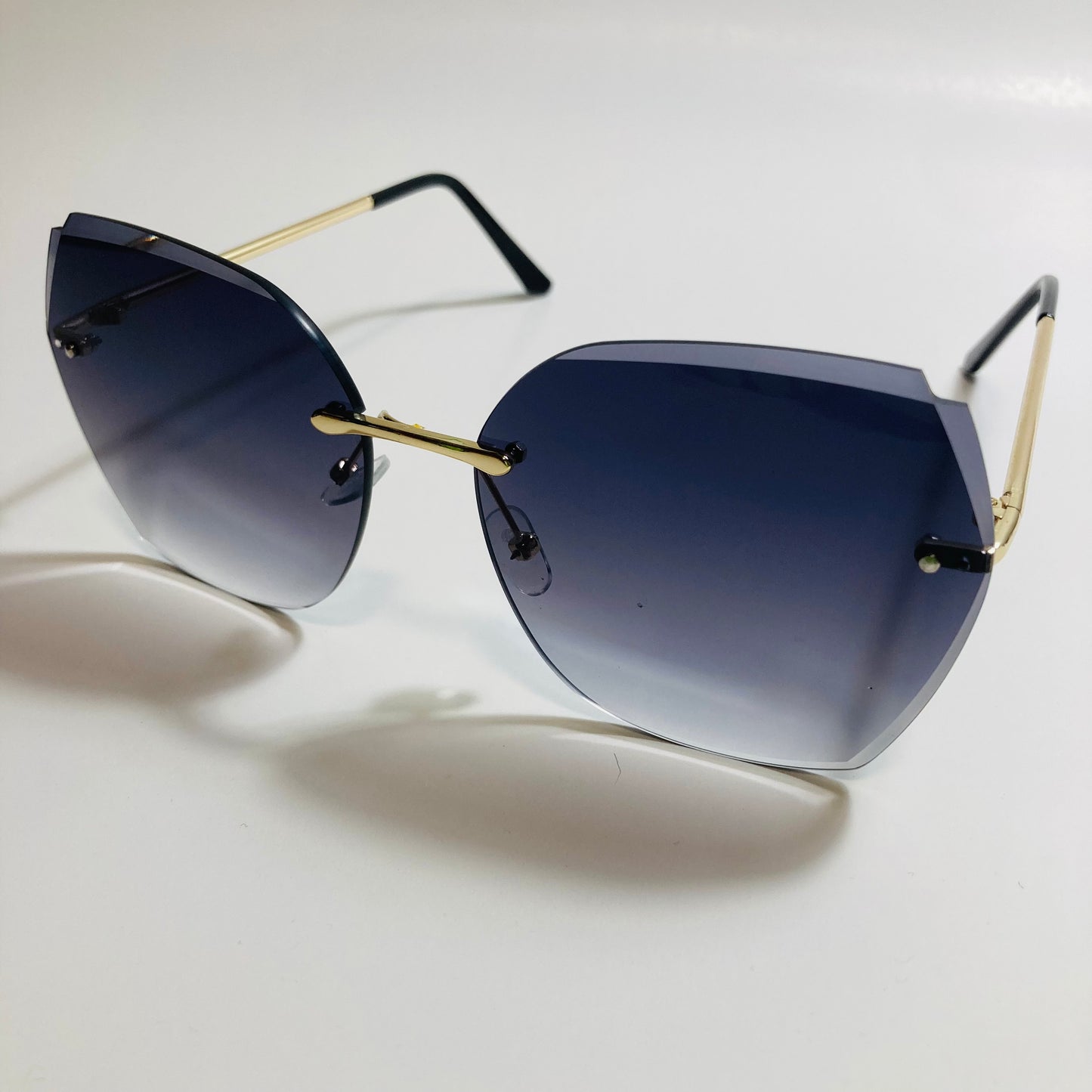 womens black oversize rimless sunglasses