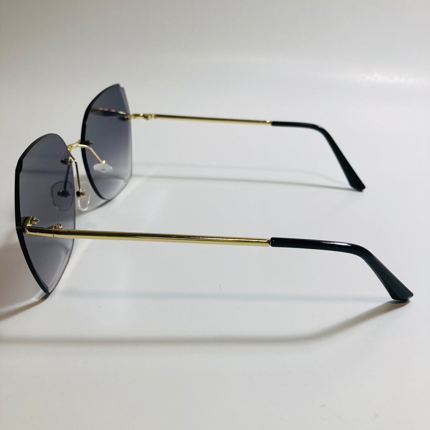 womens black oversize rimless sunglasses