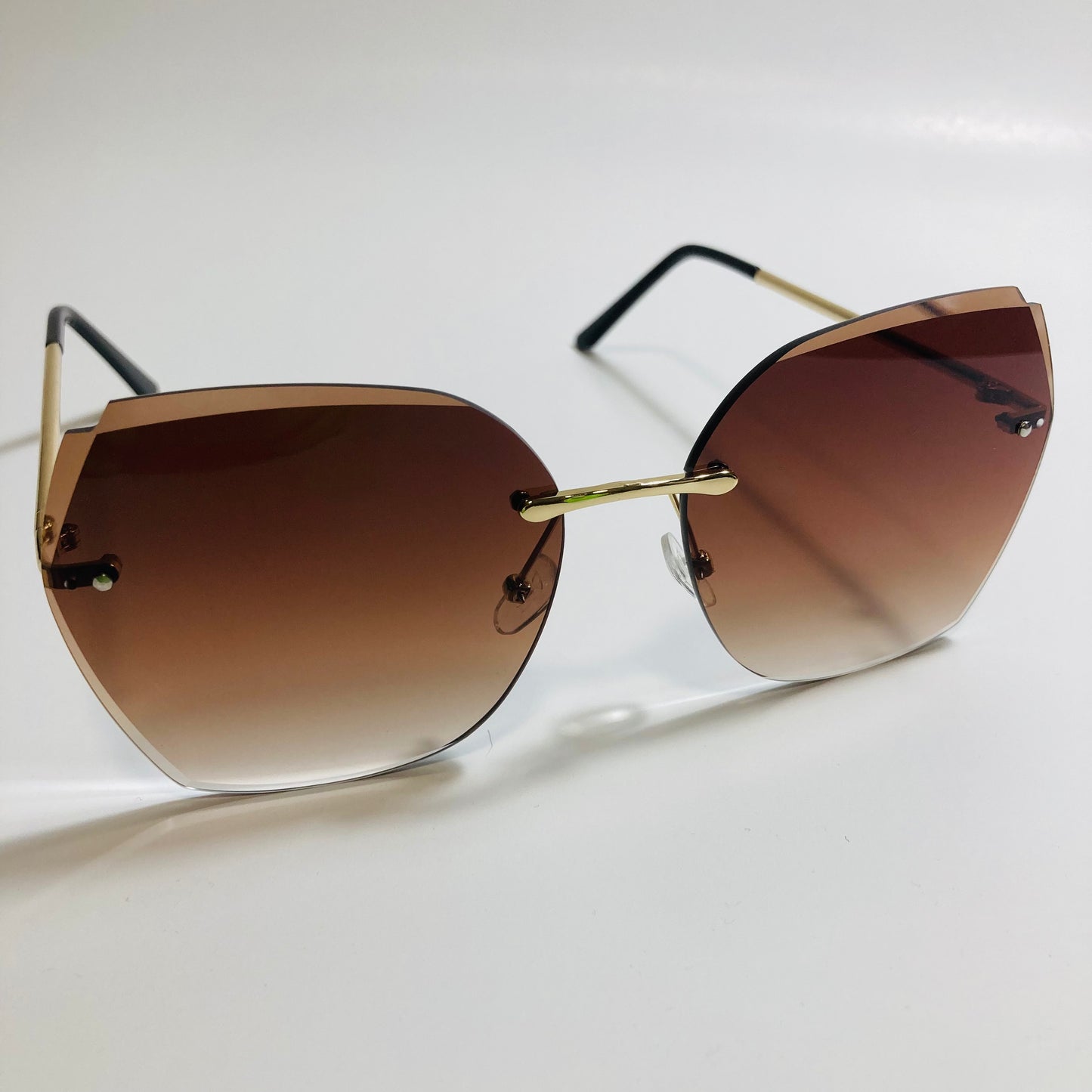womens brown oversize rimless sunglasses