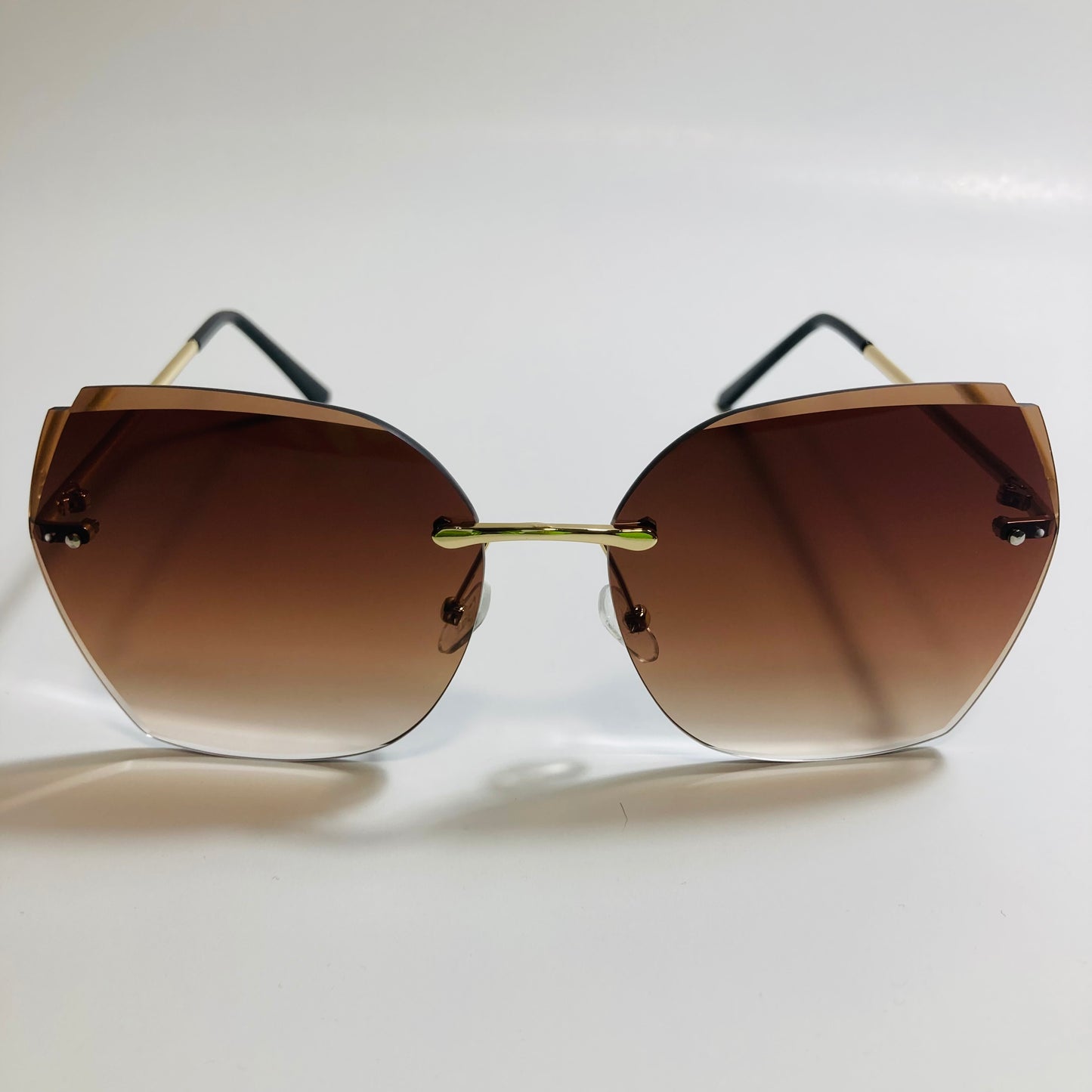 womens brown oversize rimless sunglasses