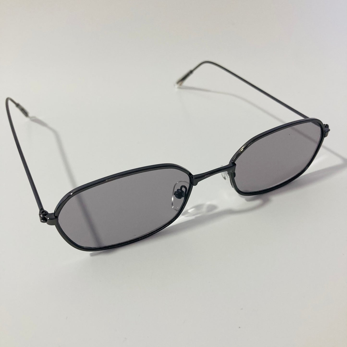 mens and womens black and gray oval sunglasses