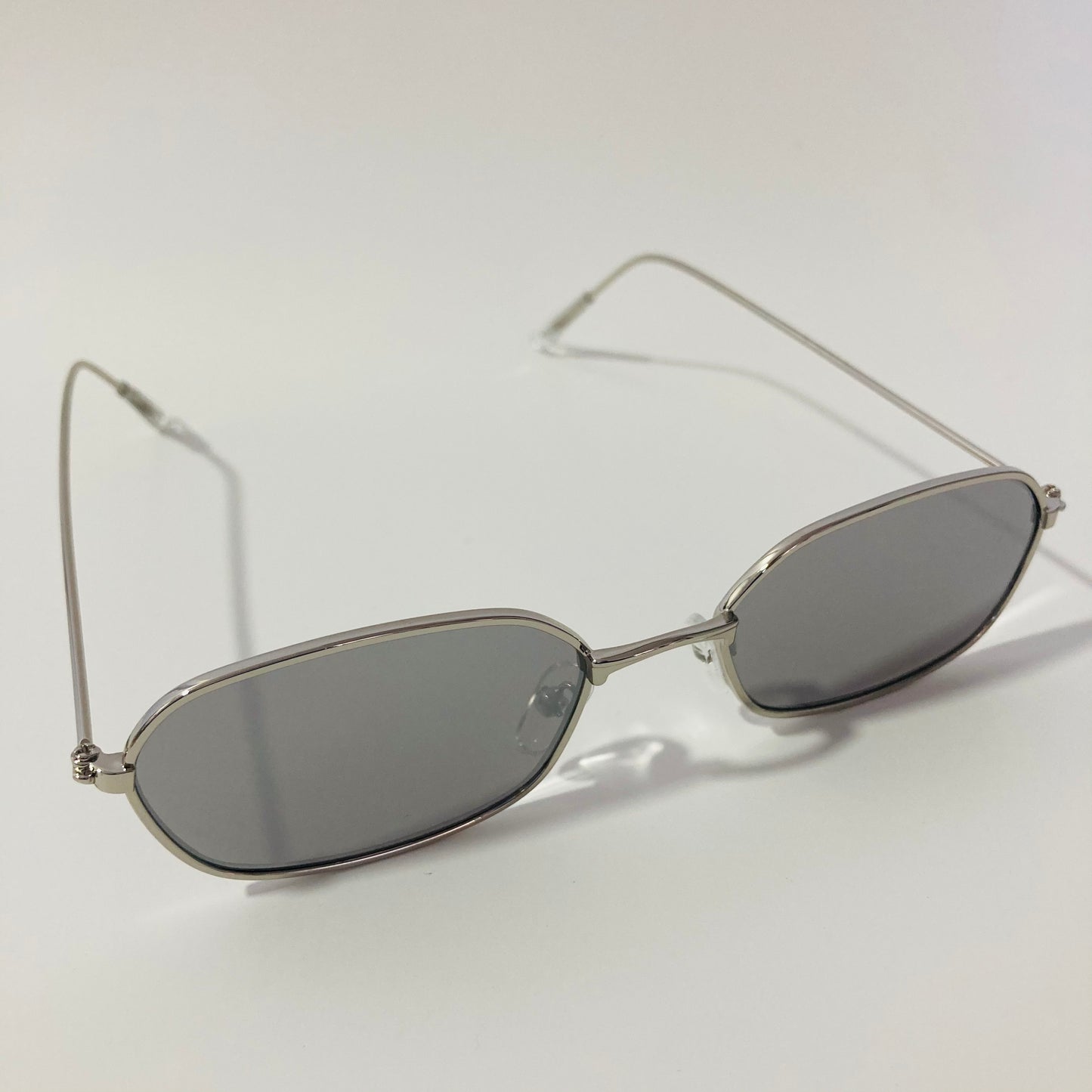 mens and womens silver mirrored oval sunglasses
