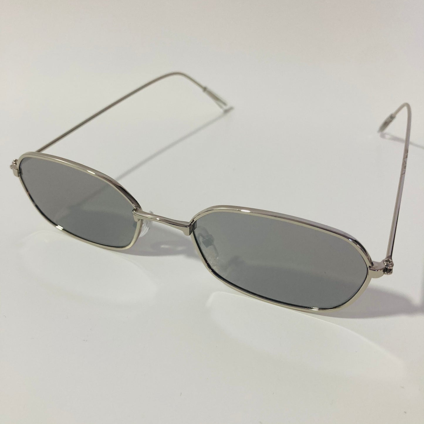 mens and womens silver mirrored oval sunglasses