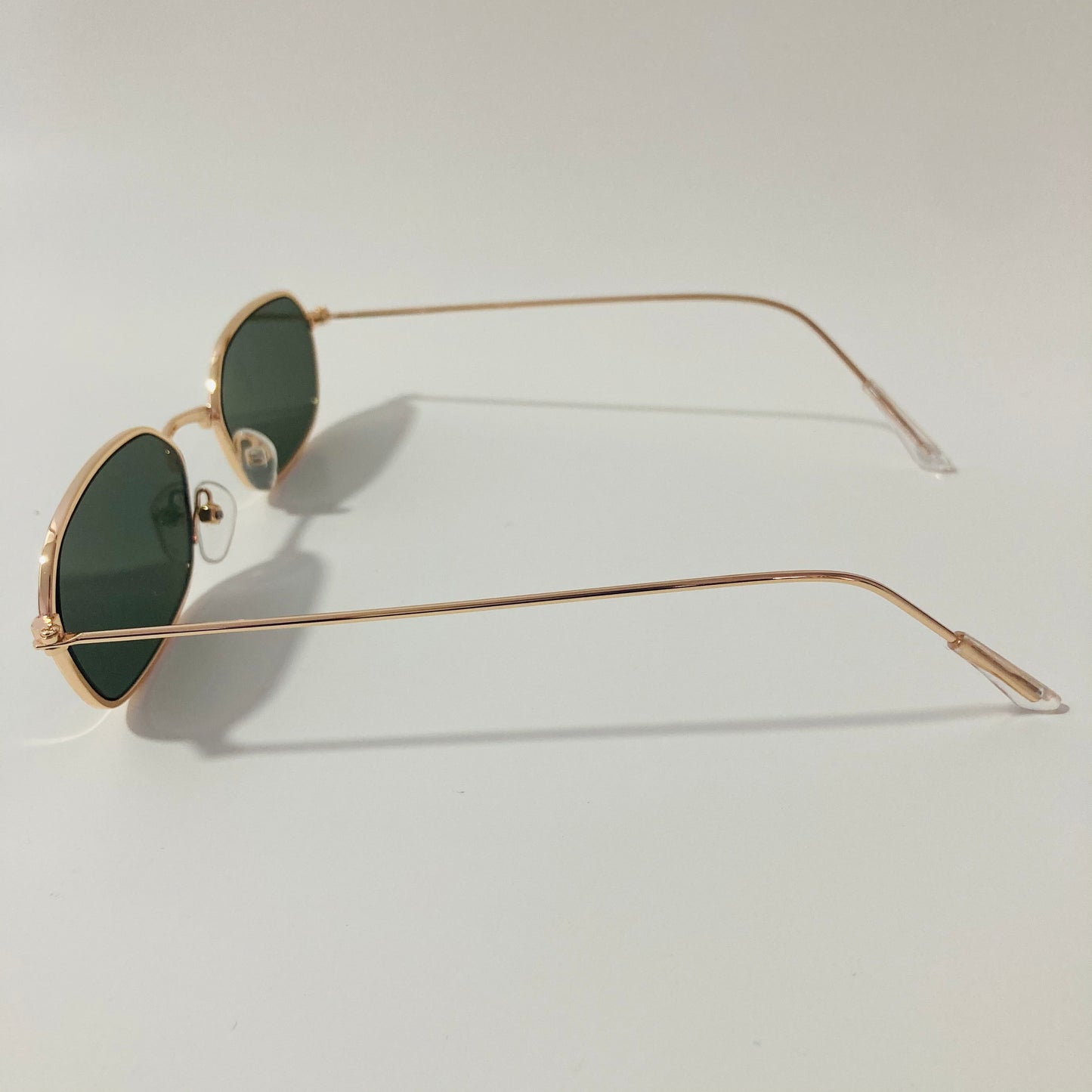 mens and womens green and gold oval sunglasses