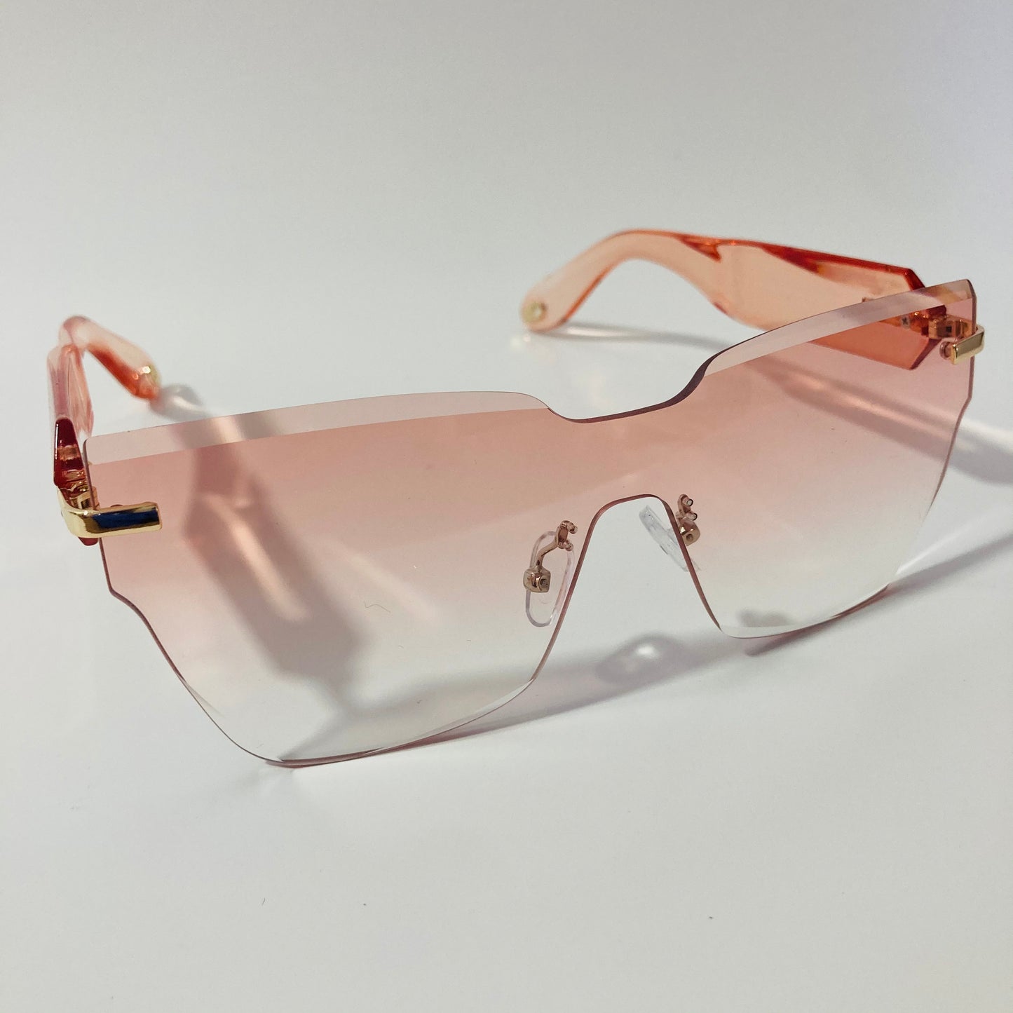 womens pink square rimless sunglasses