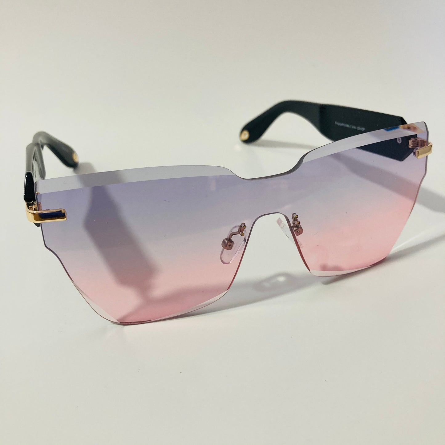 womens pink and blue square rimless sunglasses