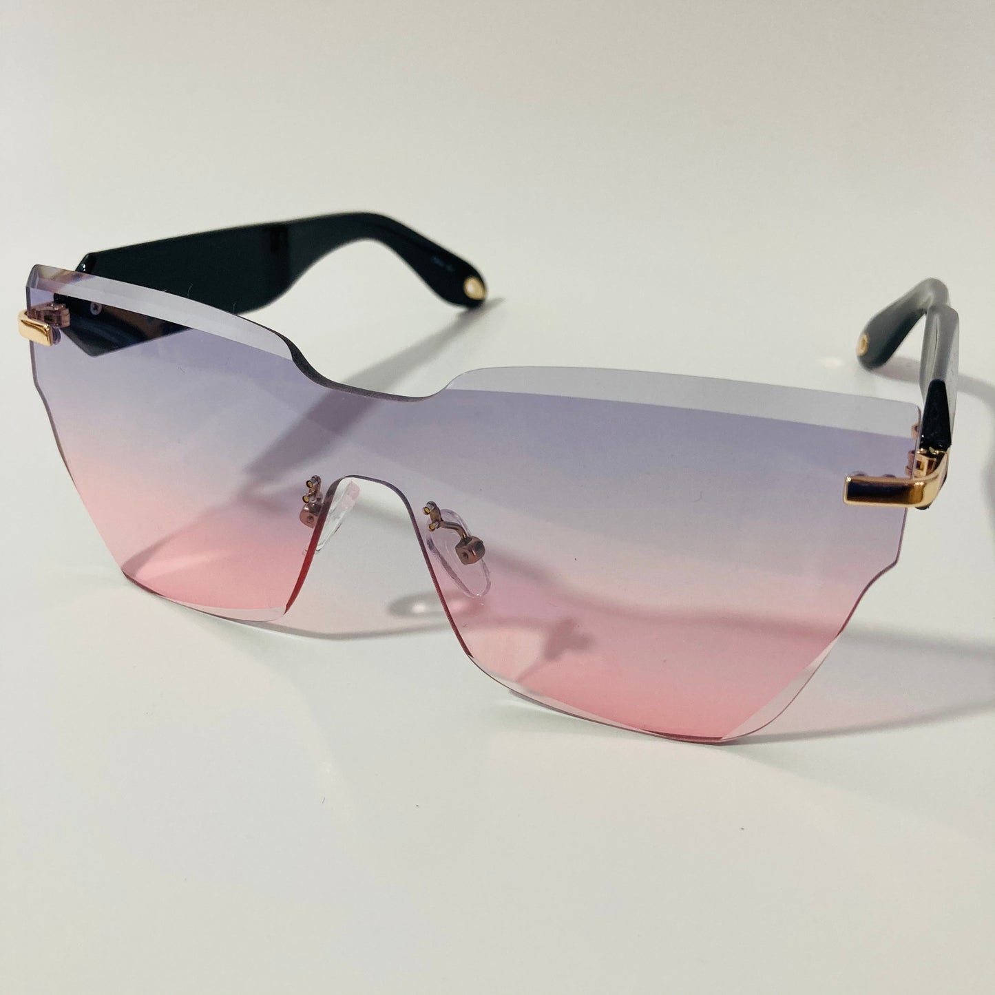 womens pink and blue square rimless sunglasses