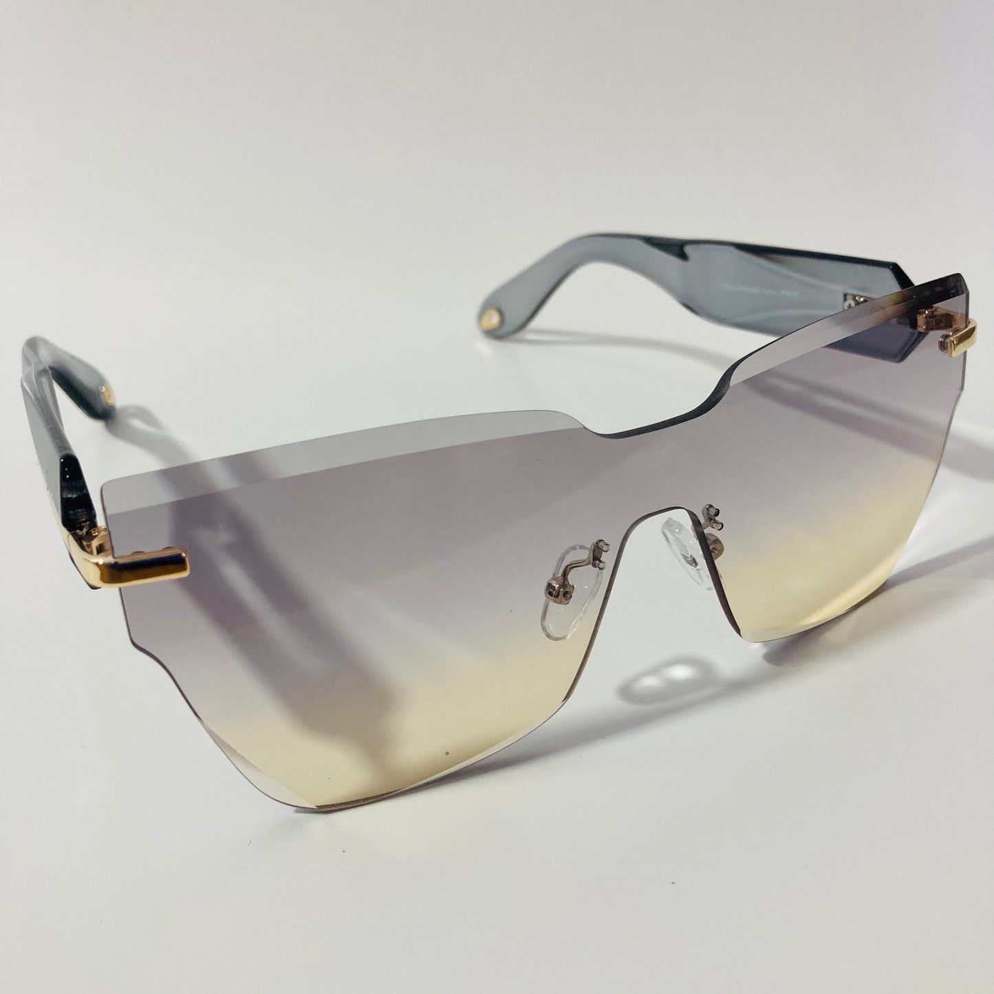 womens gray and yellow square rimless sunglasses