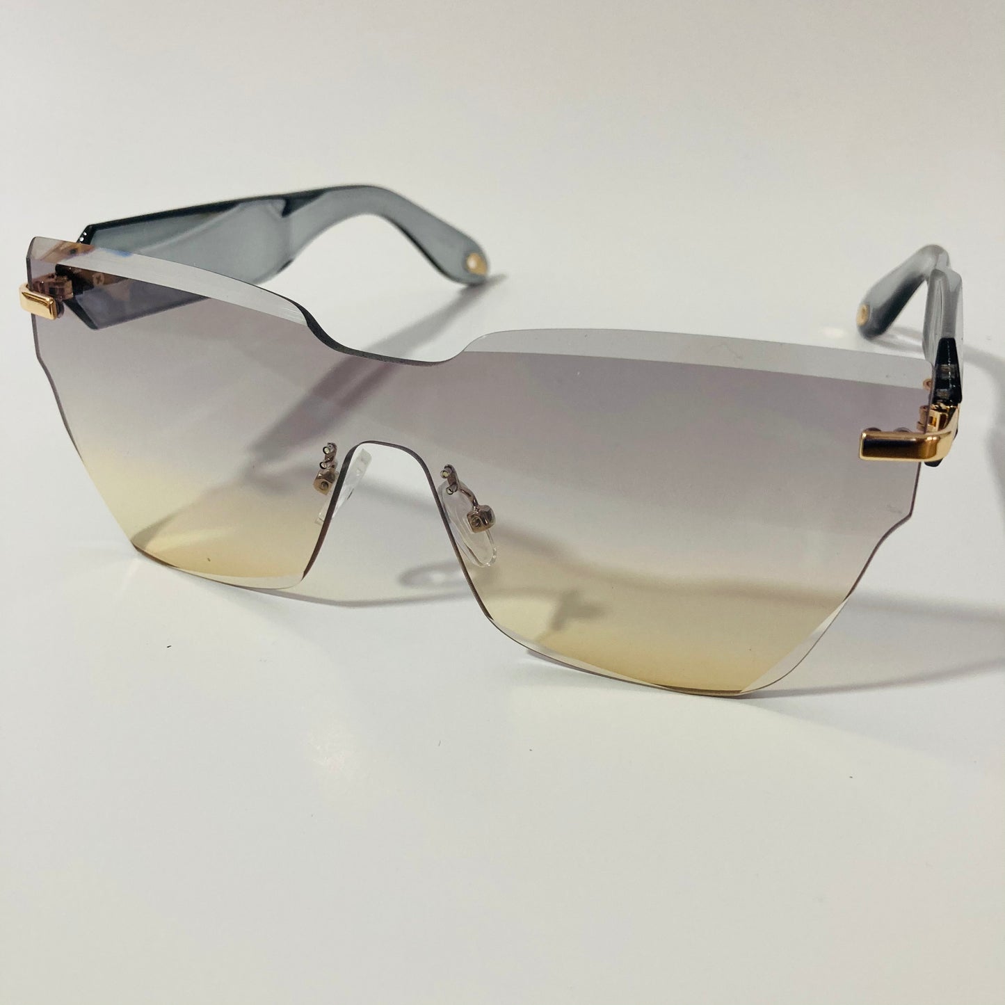 womens gray and yellow square rimless sunglasses